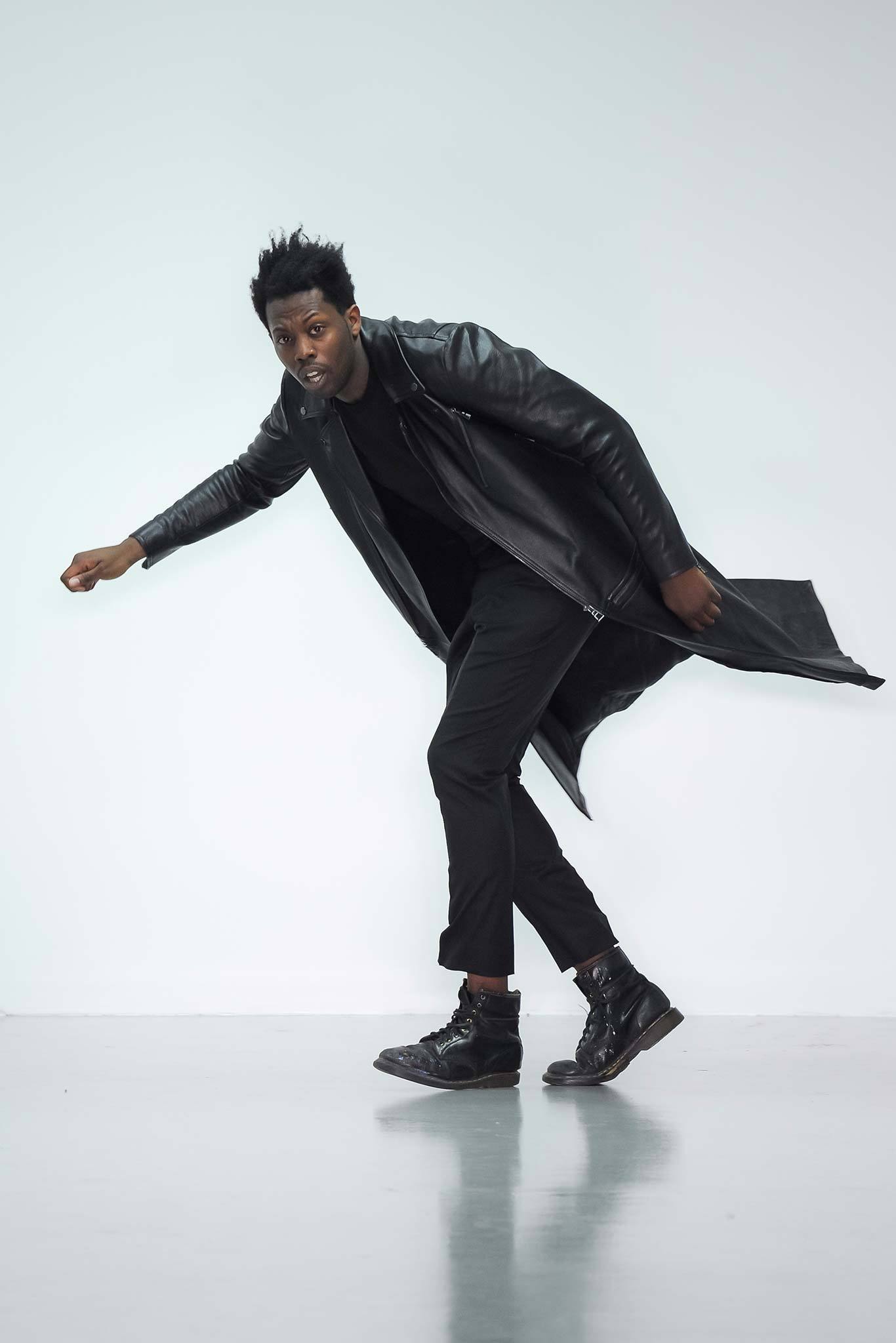 black leather coat with slim pants