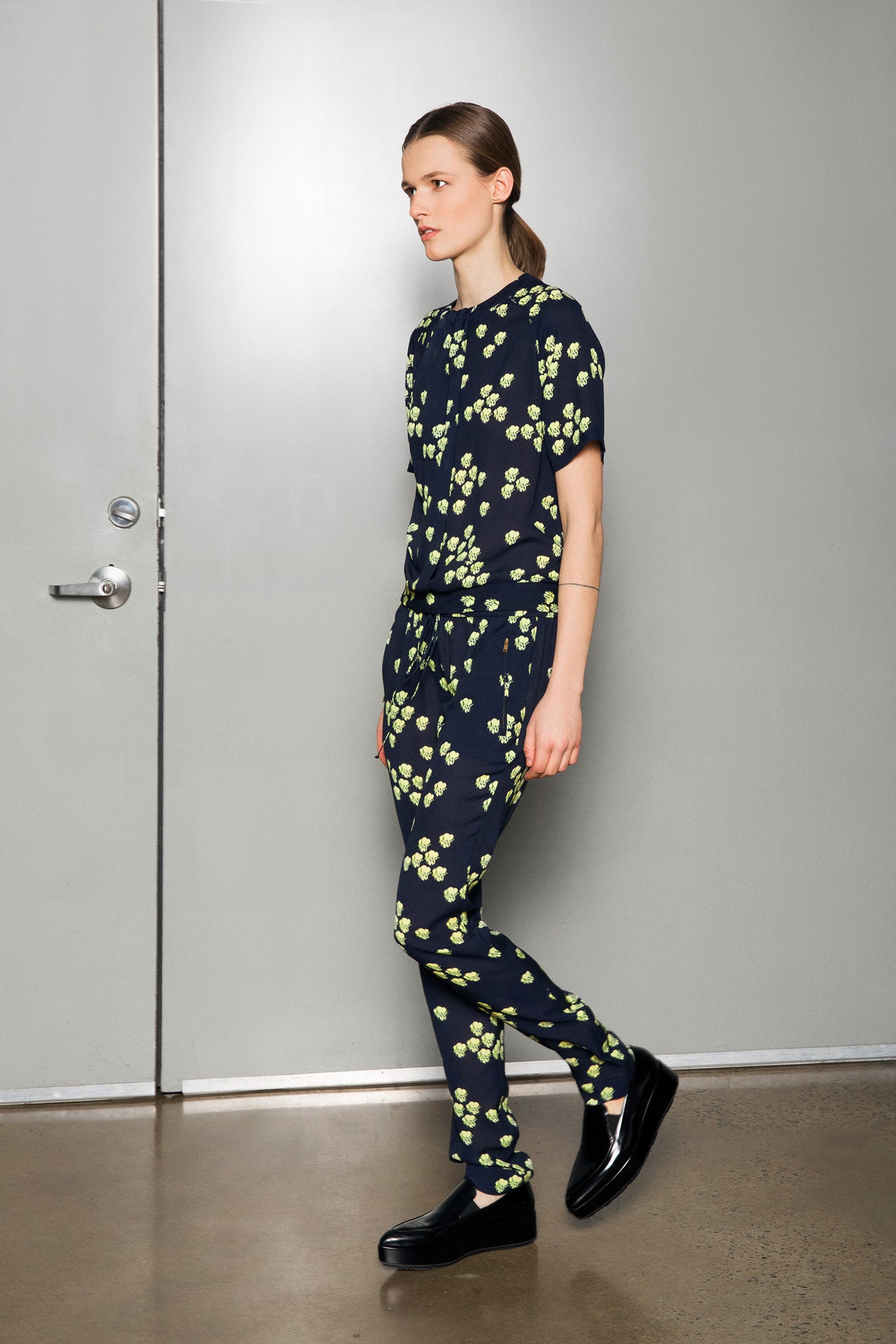 black and green printed top and pants