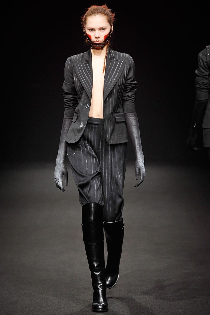 black tailored blazer and slim pants