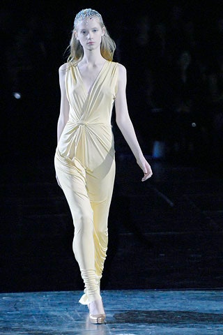 fitted yellow sleeveless jumpsuit