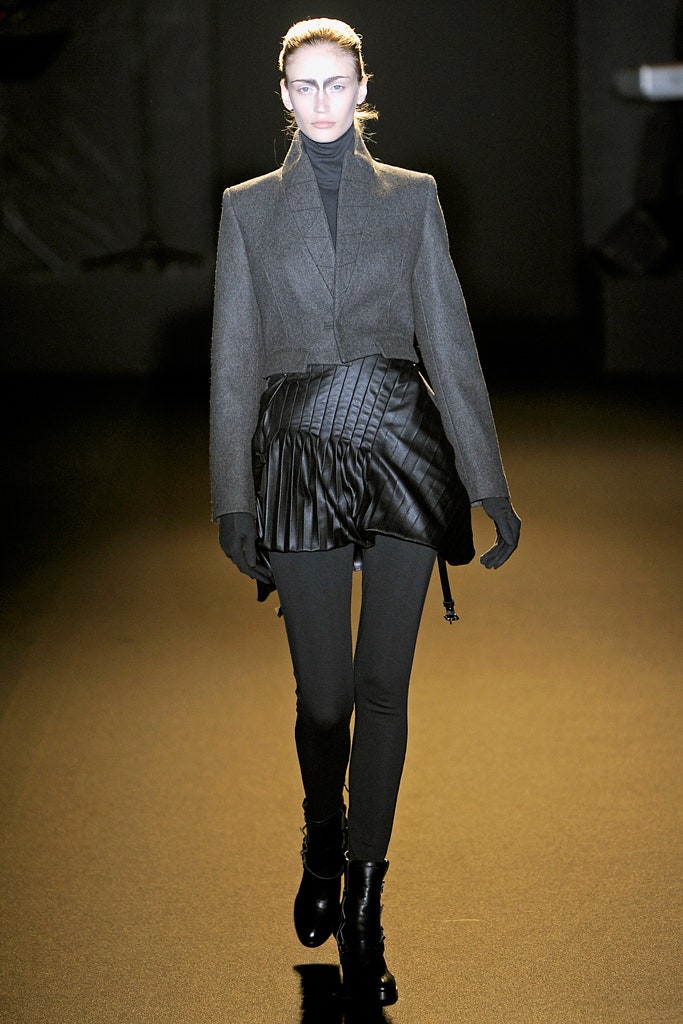 gray tailored blazer with black leather skirt