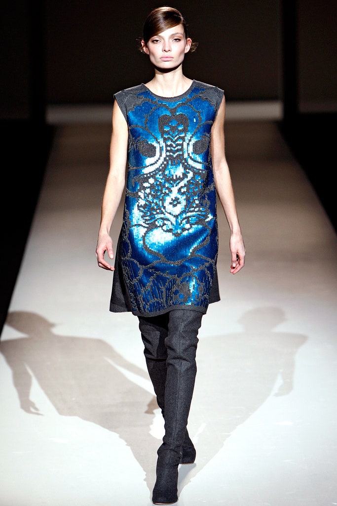 blue embellished mini dress with black pants