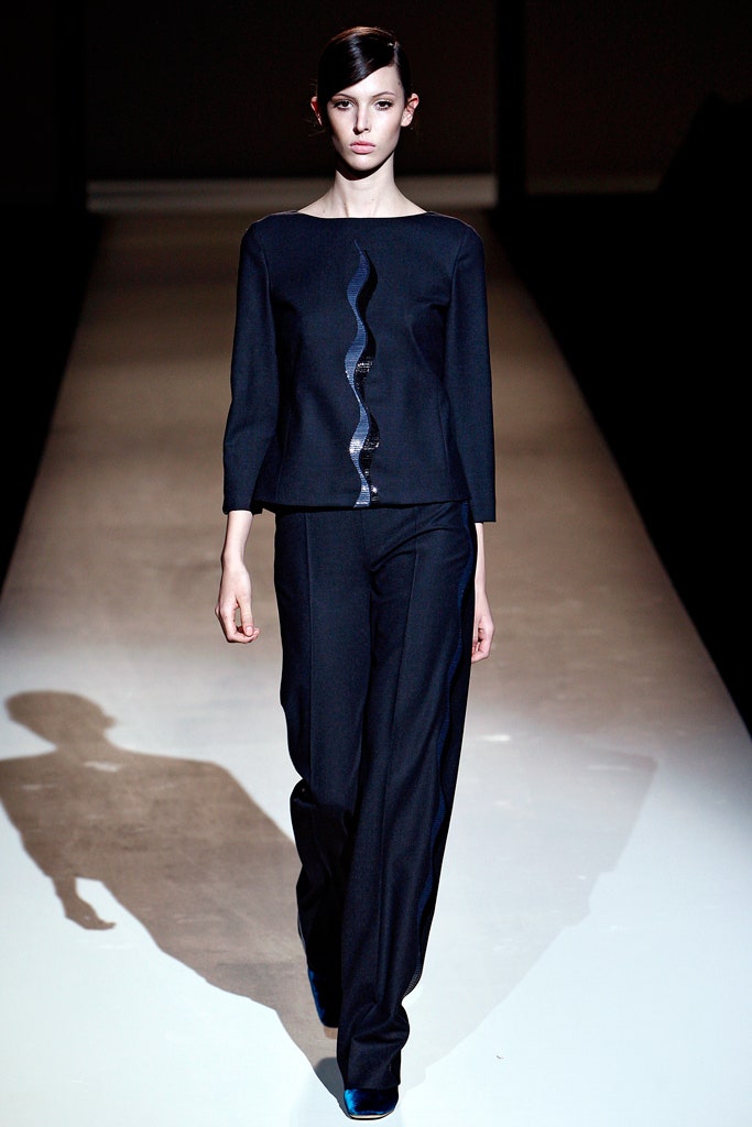black fitted top and relaxed pants