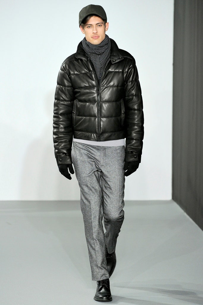 black leather jacket with gray pants