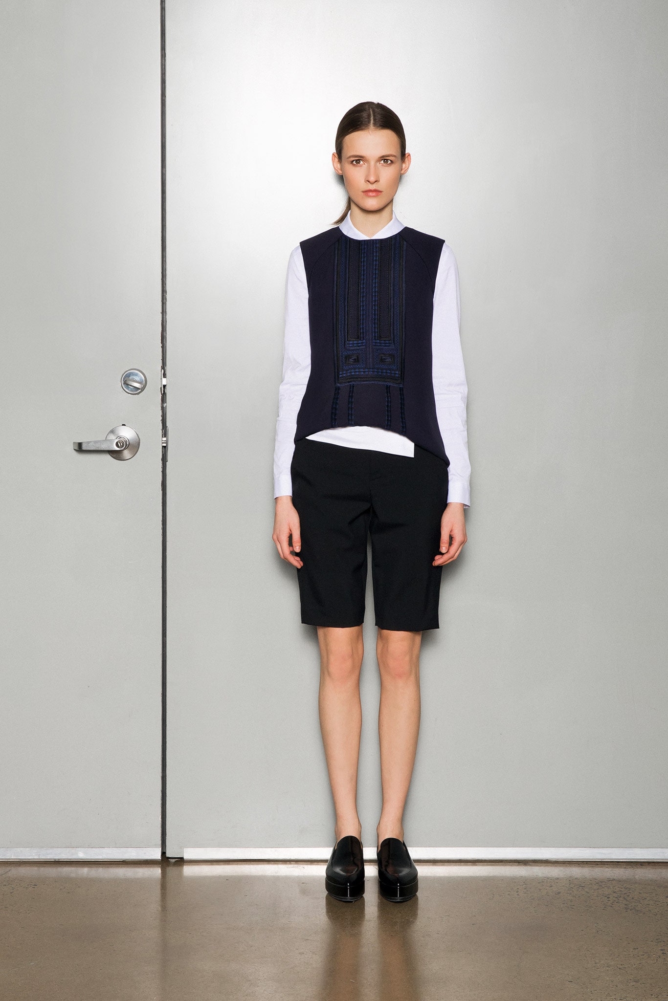 white cotton long-sleeve collared fitted top