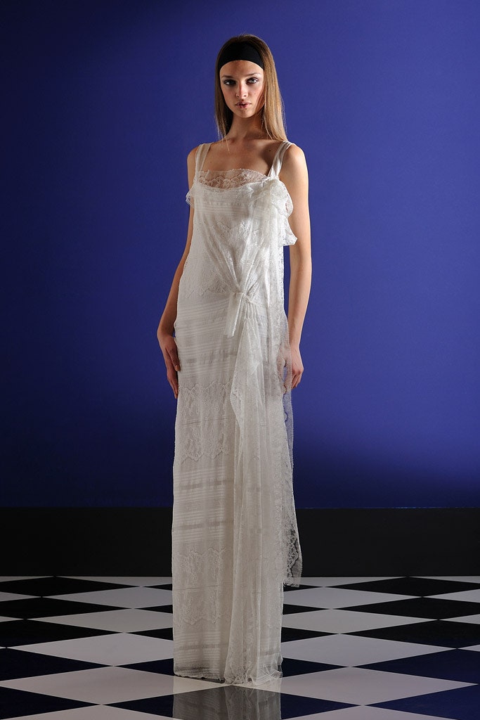 white lace sleeveless gown