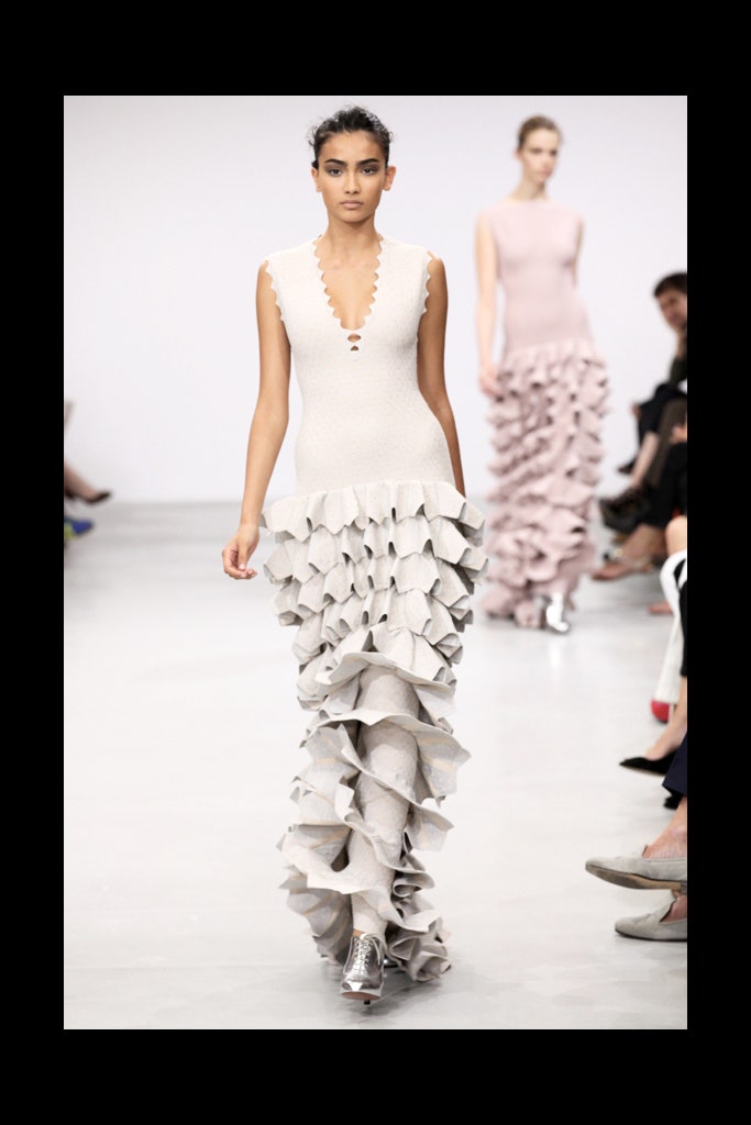 beige fitted sleeveless ruffled dress