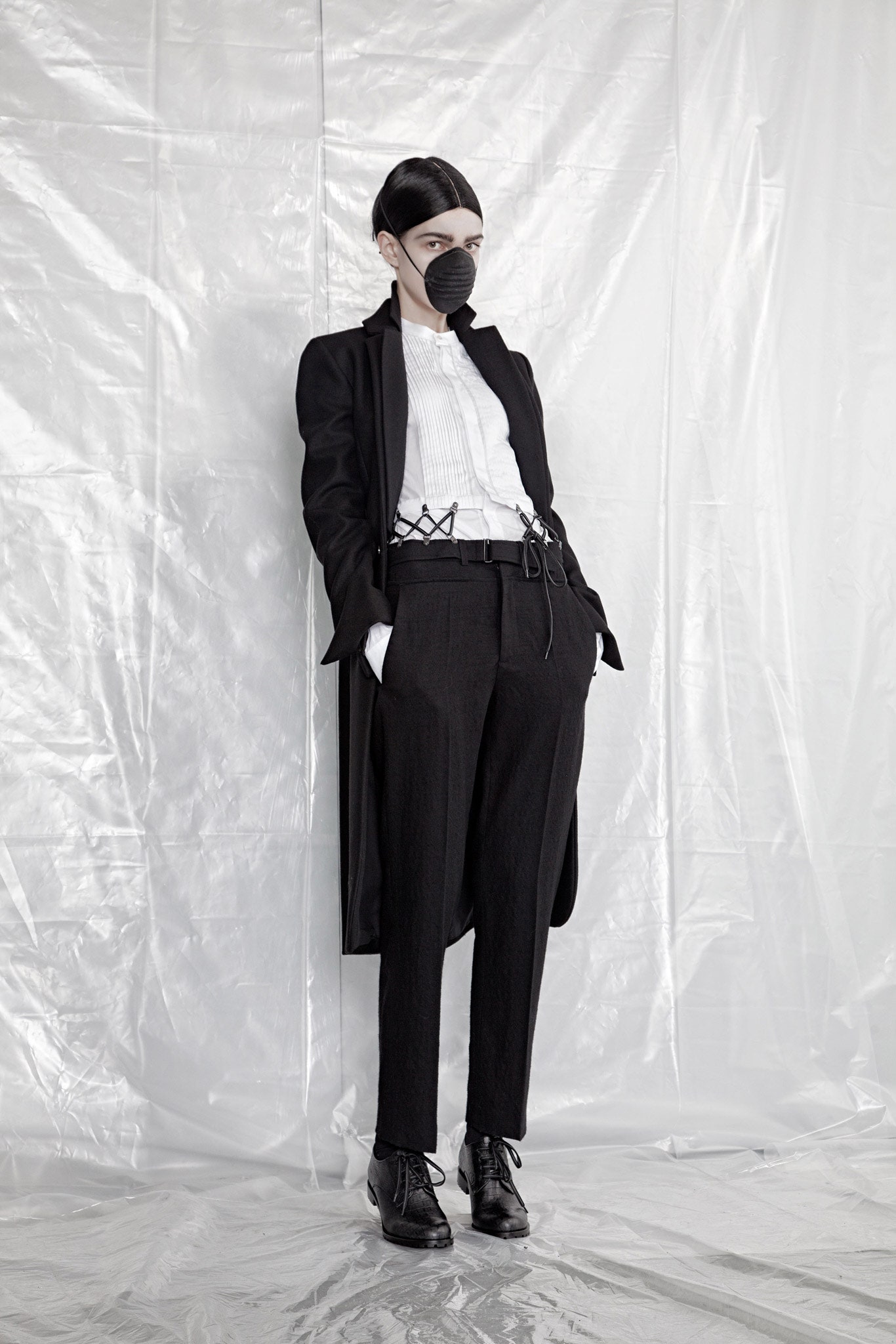 black wool long-sleeve collared tailored buttoned coat