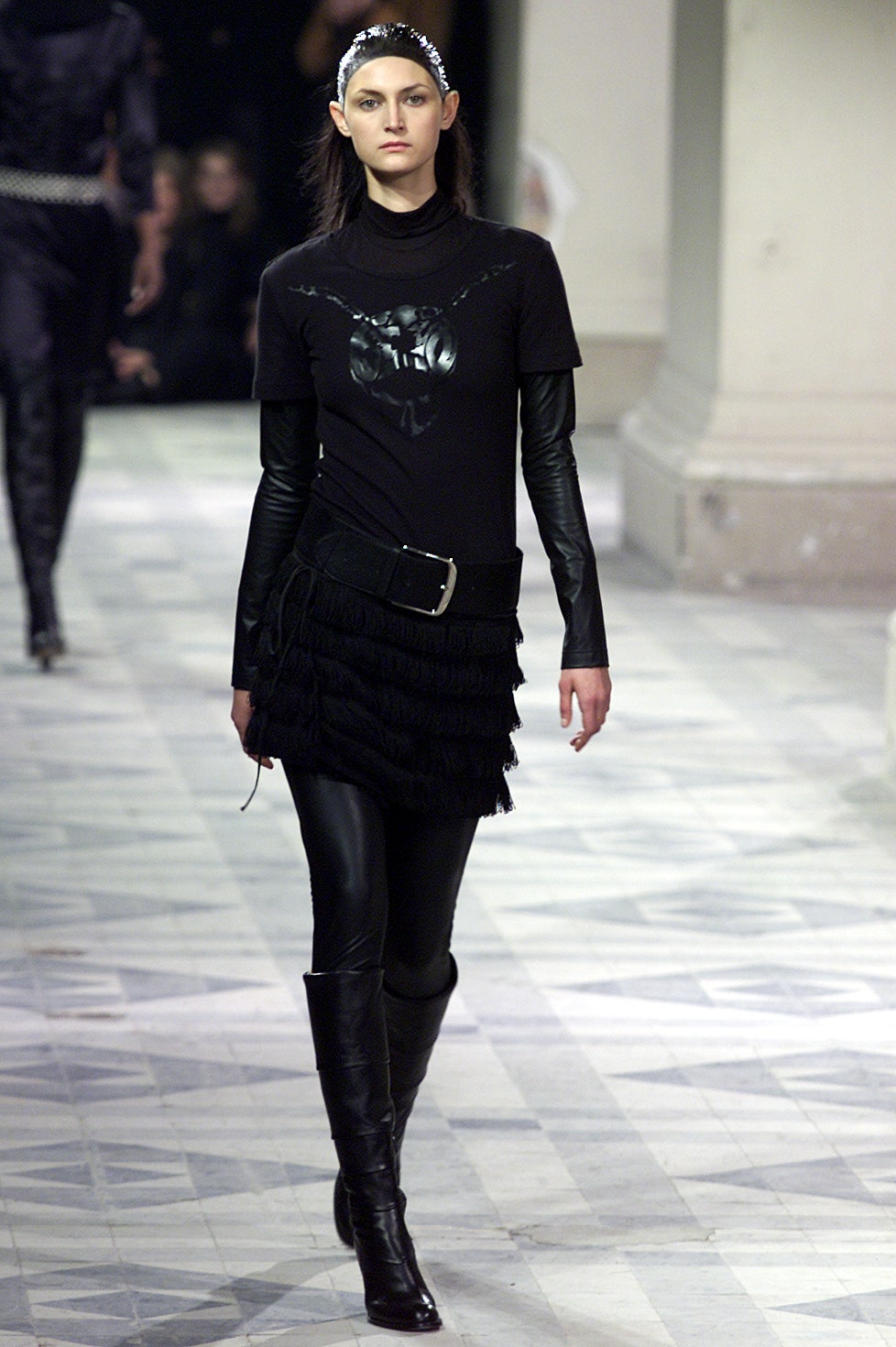 black fitted top with fringed skirt