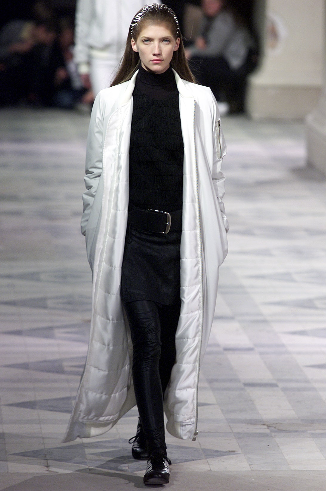 white vinyl coat with black top