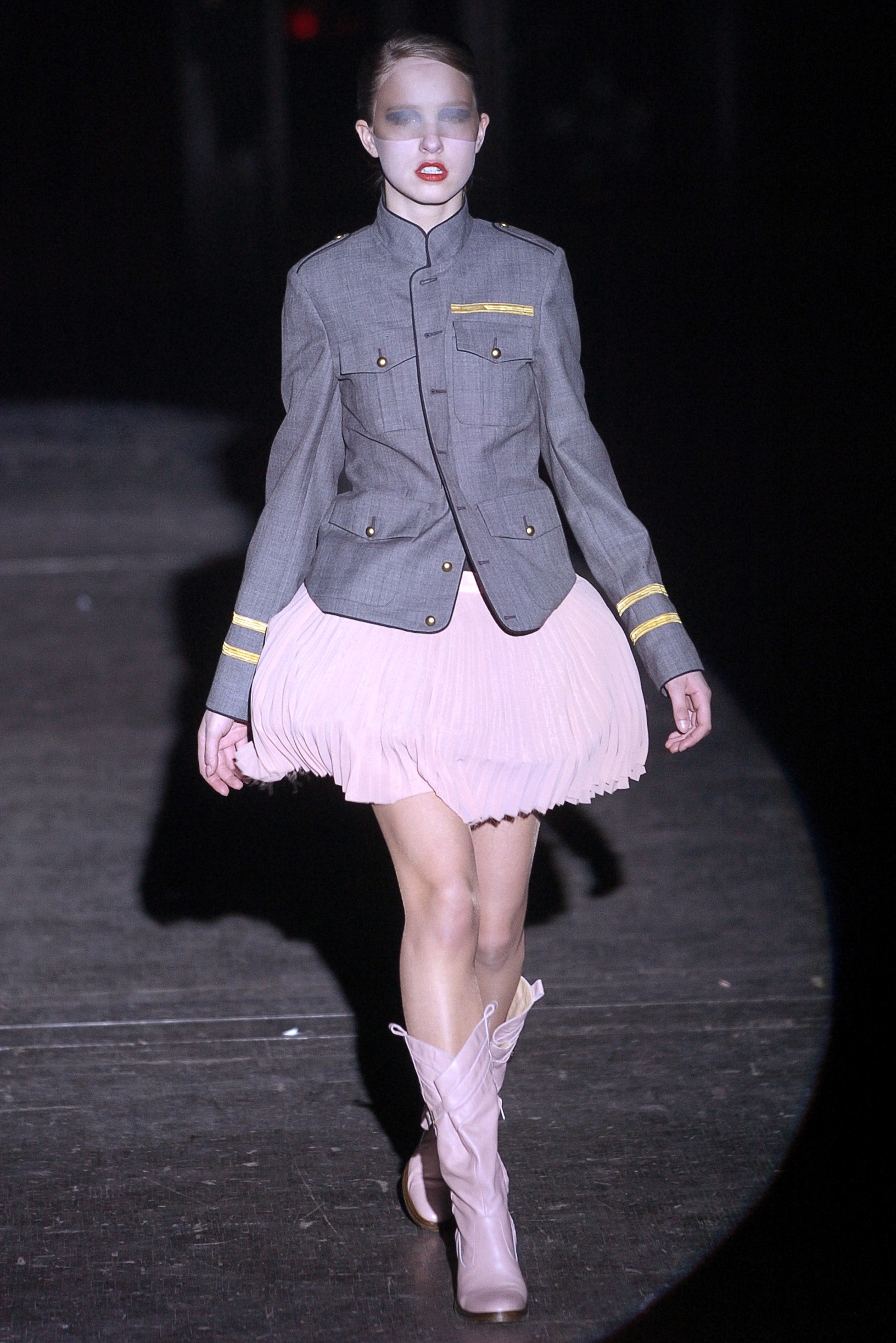 gray jacket pink pleated skirt