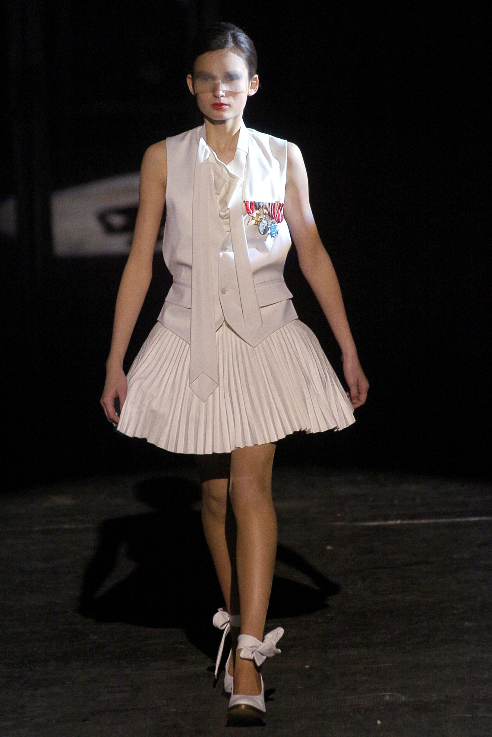 white pleated top and skirt