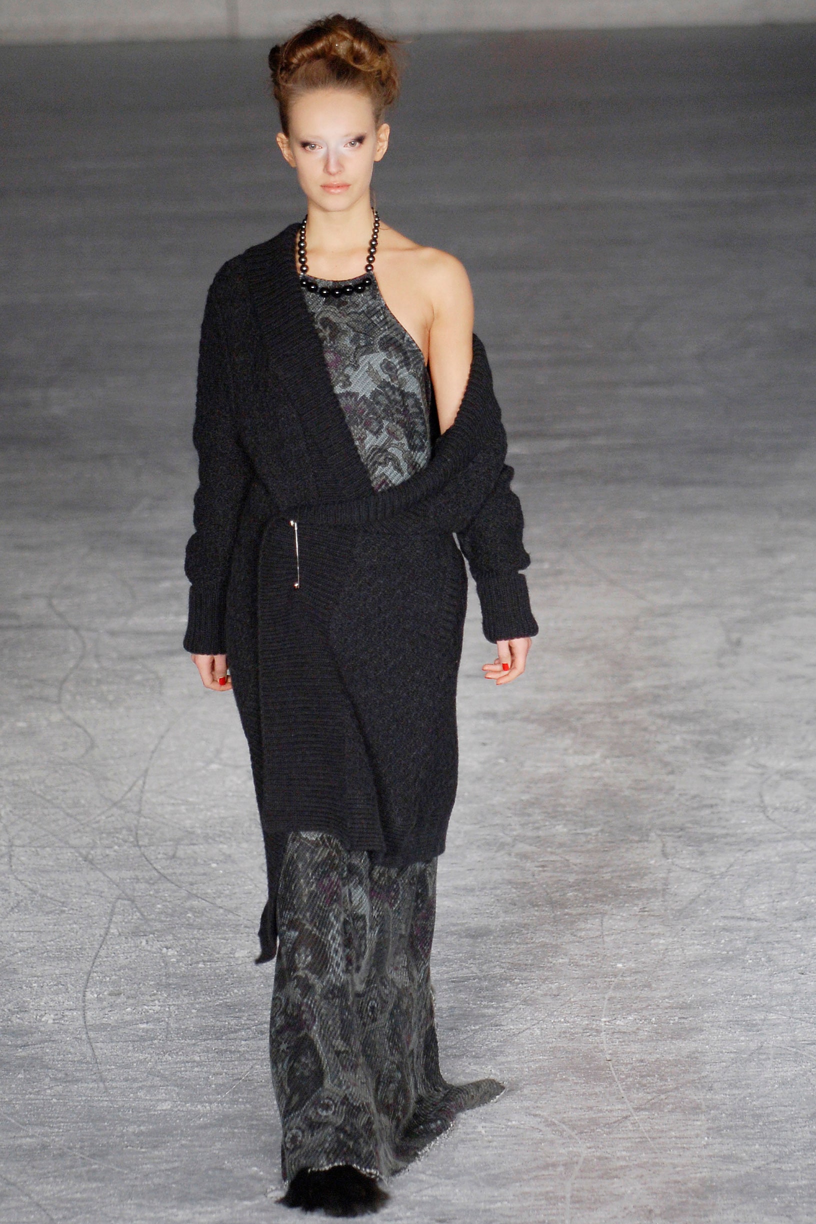 black knit coat and printed dress