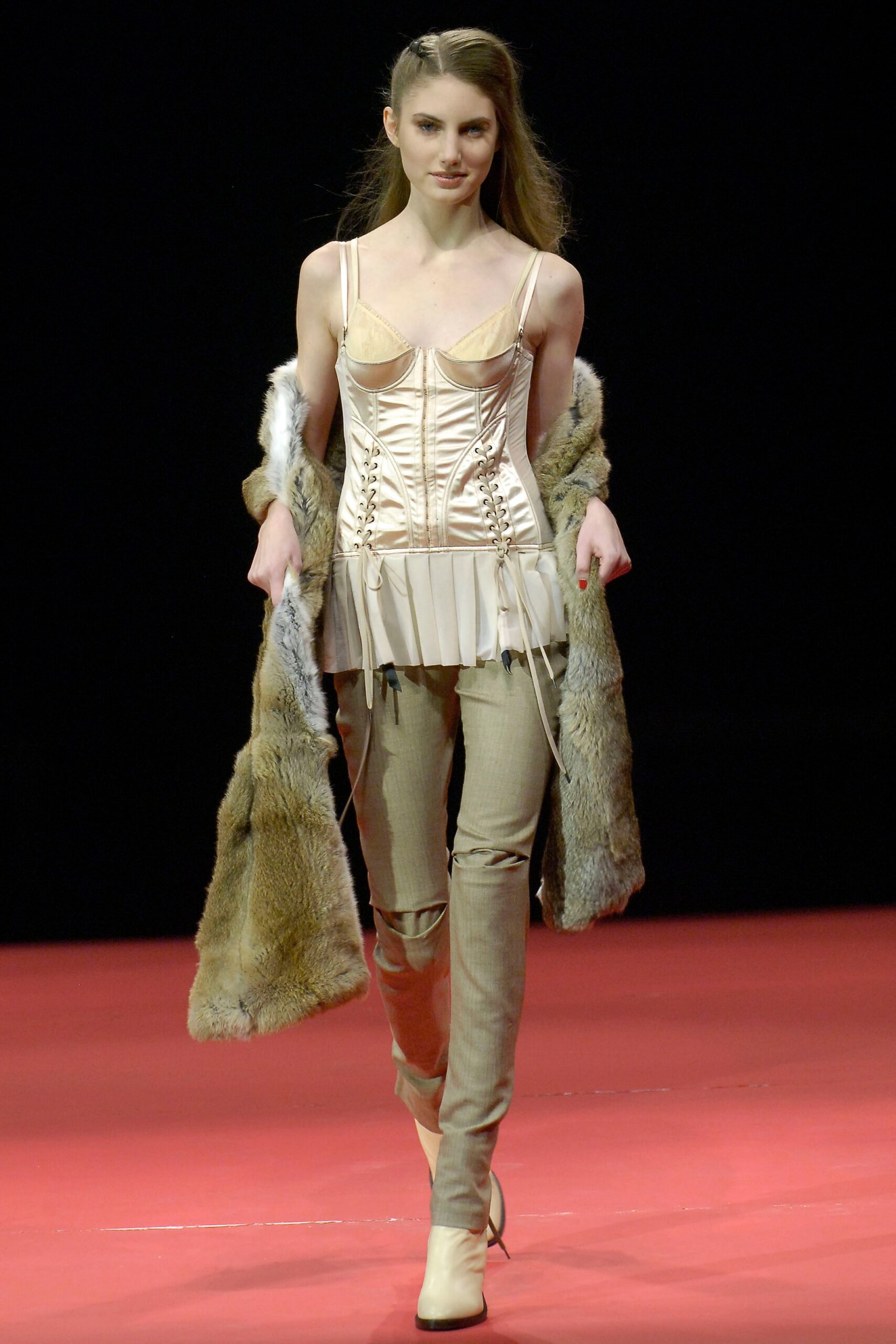 beige corset with brown fur cape