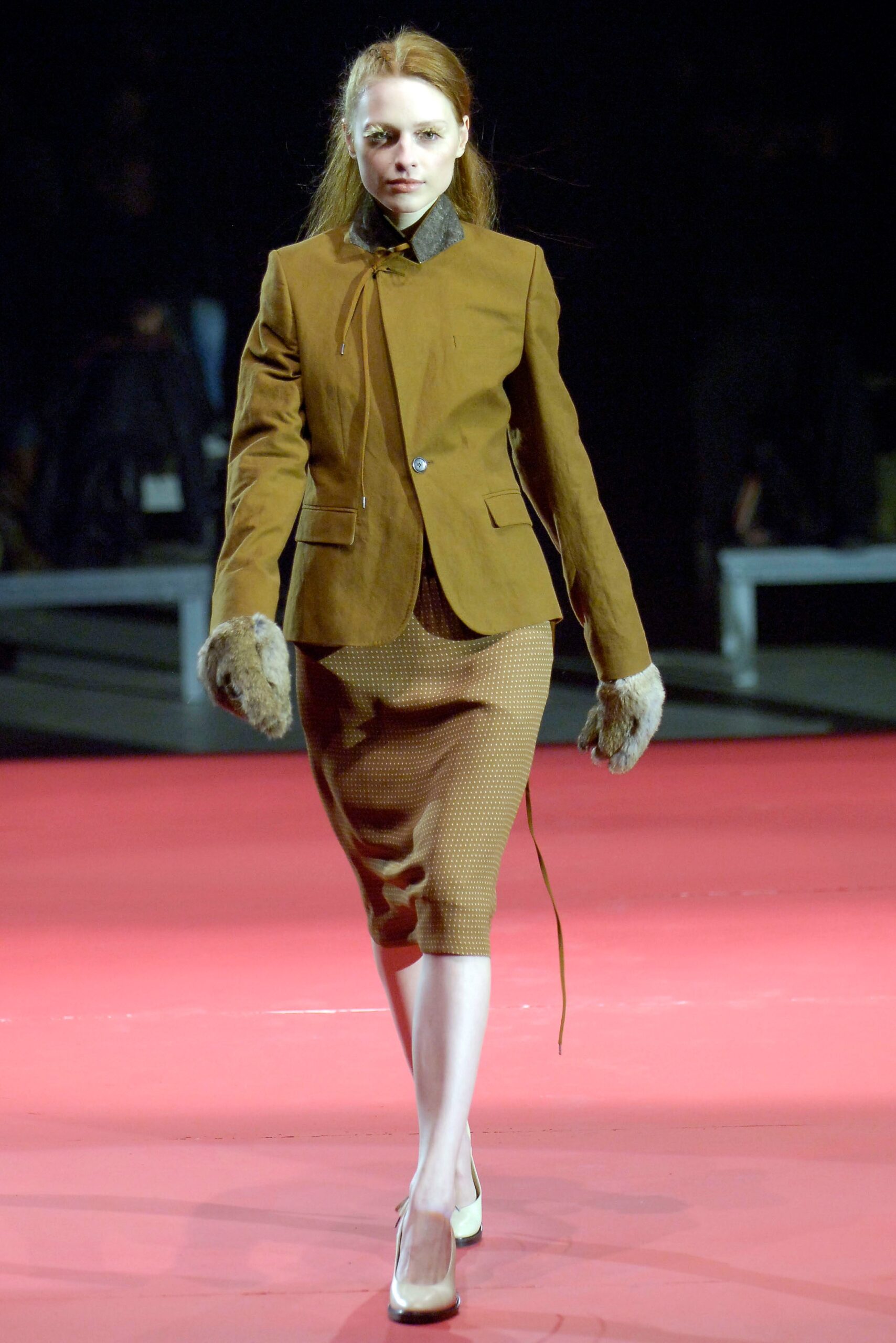 brown fitted jacket and pencil skirt