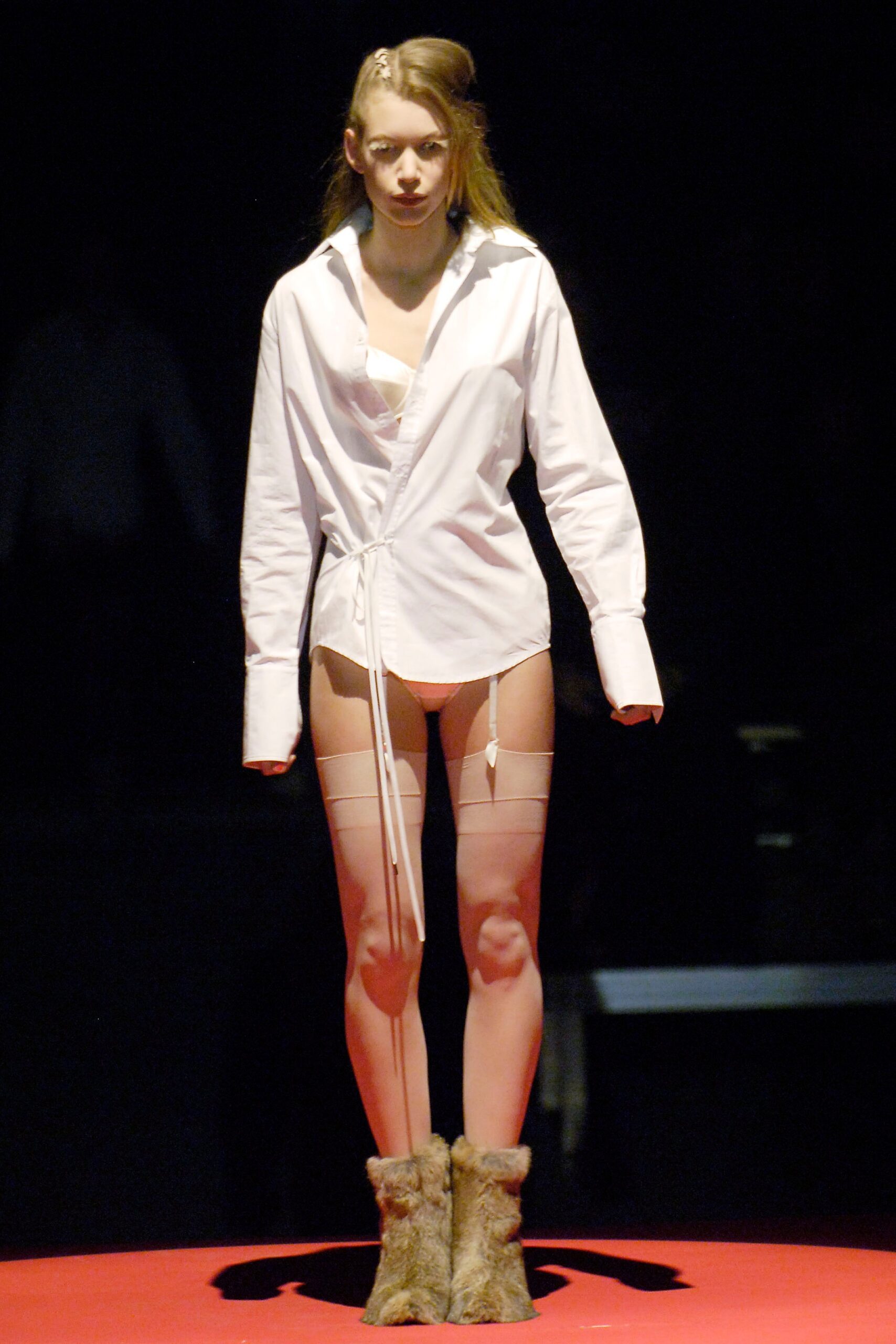 white relaxed shirt with beige shorts