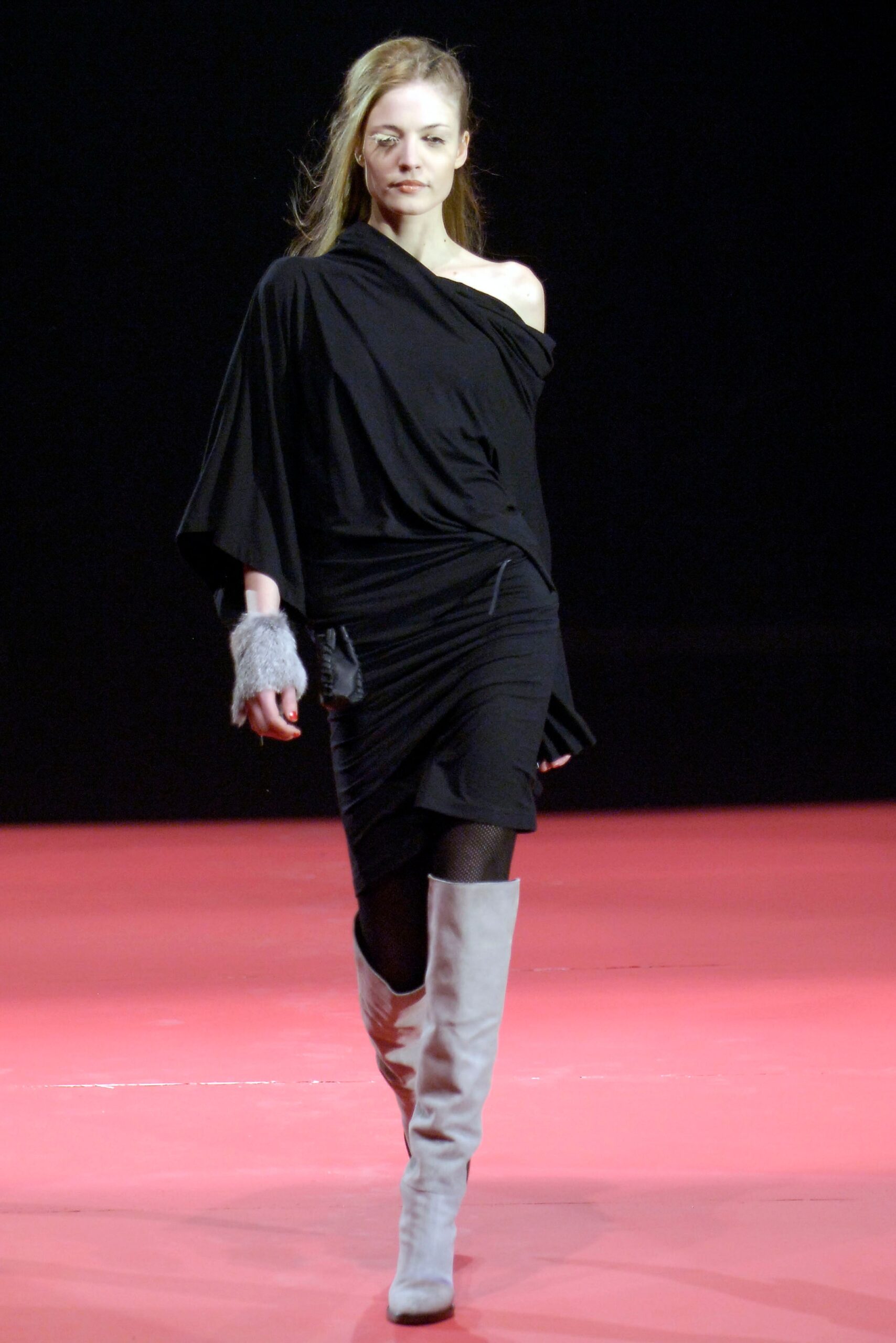 black off-shoulder mini dress with gray boots