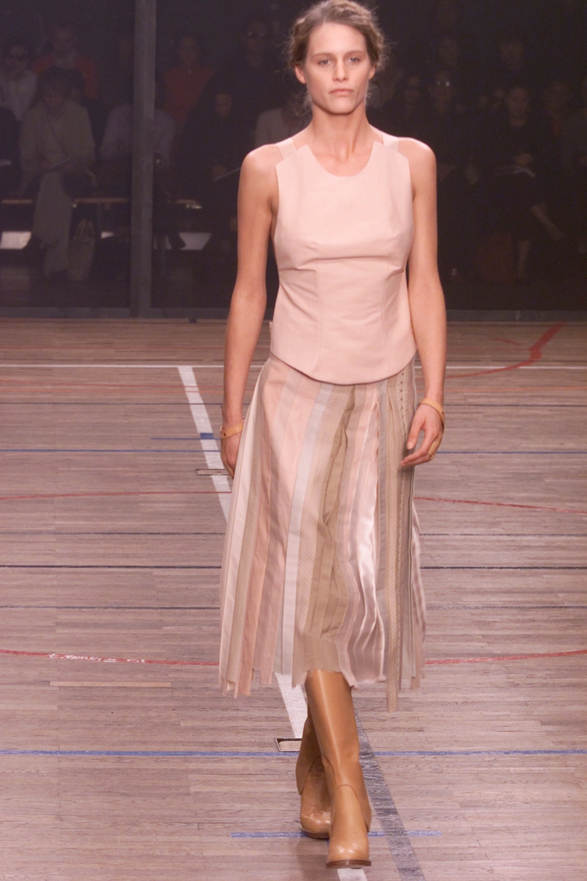 beige silk sleeveless high-neck fitted structured top