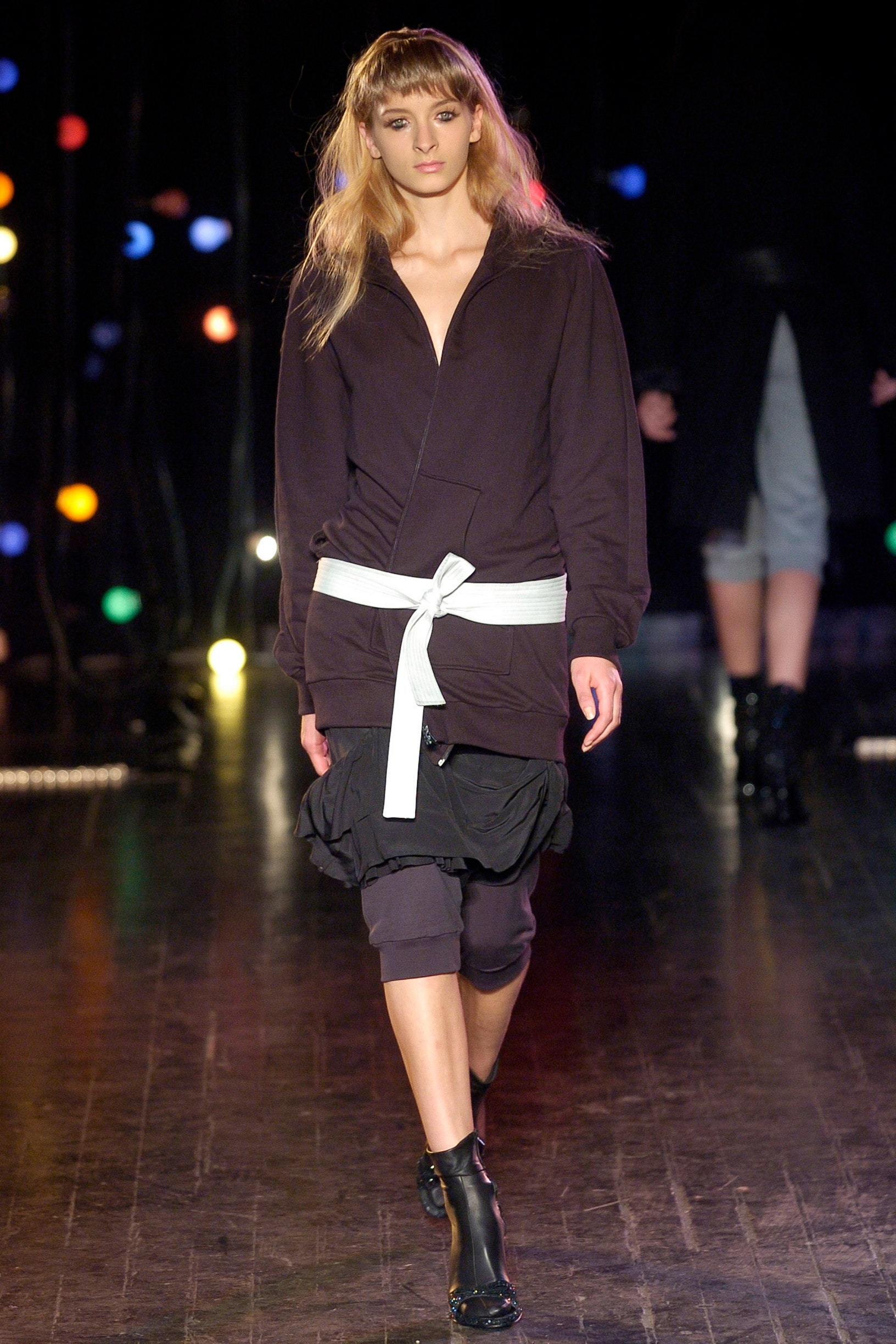 black relaxed jacket with white belt
