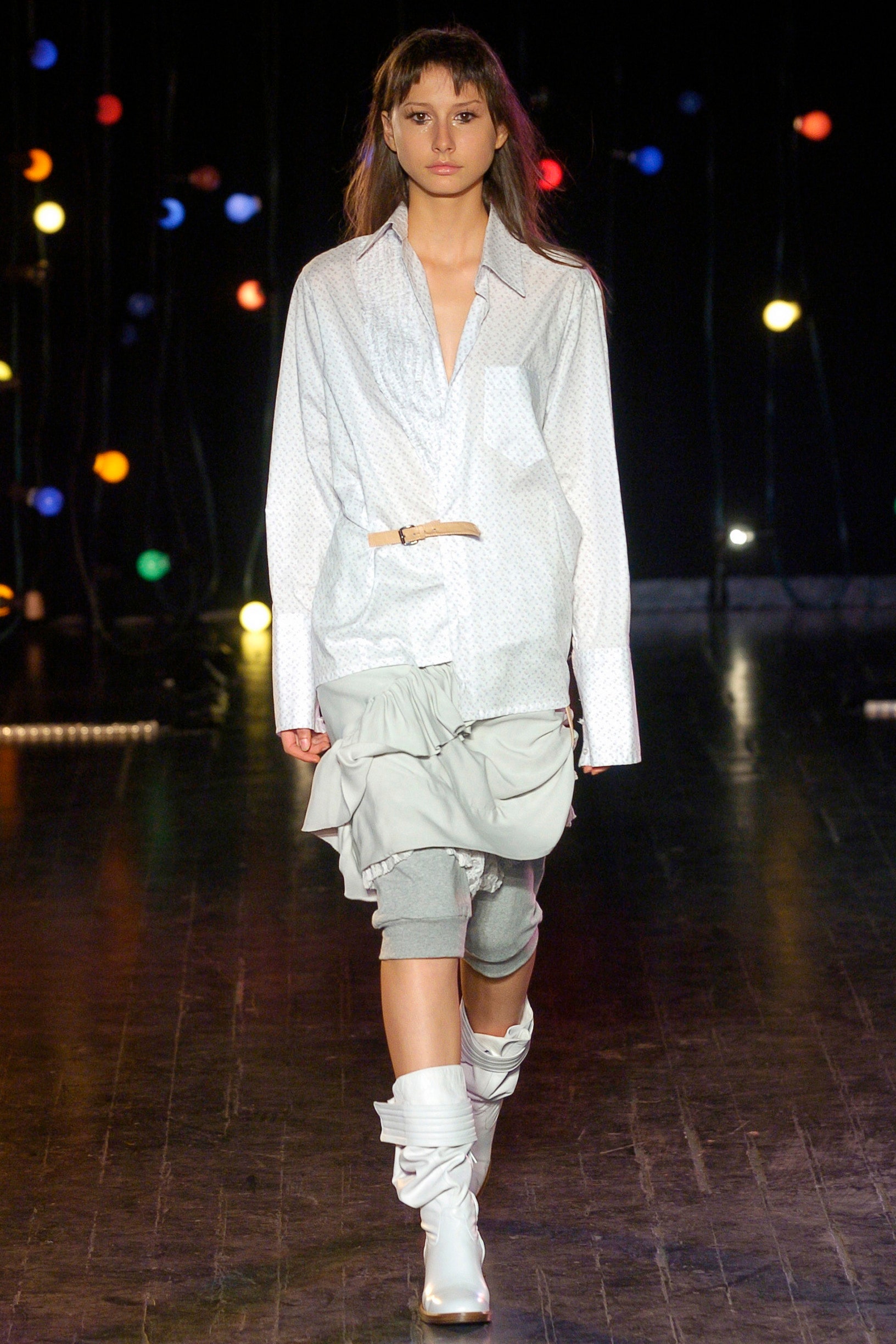 white relaxed shirt with gray ruffled skirt