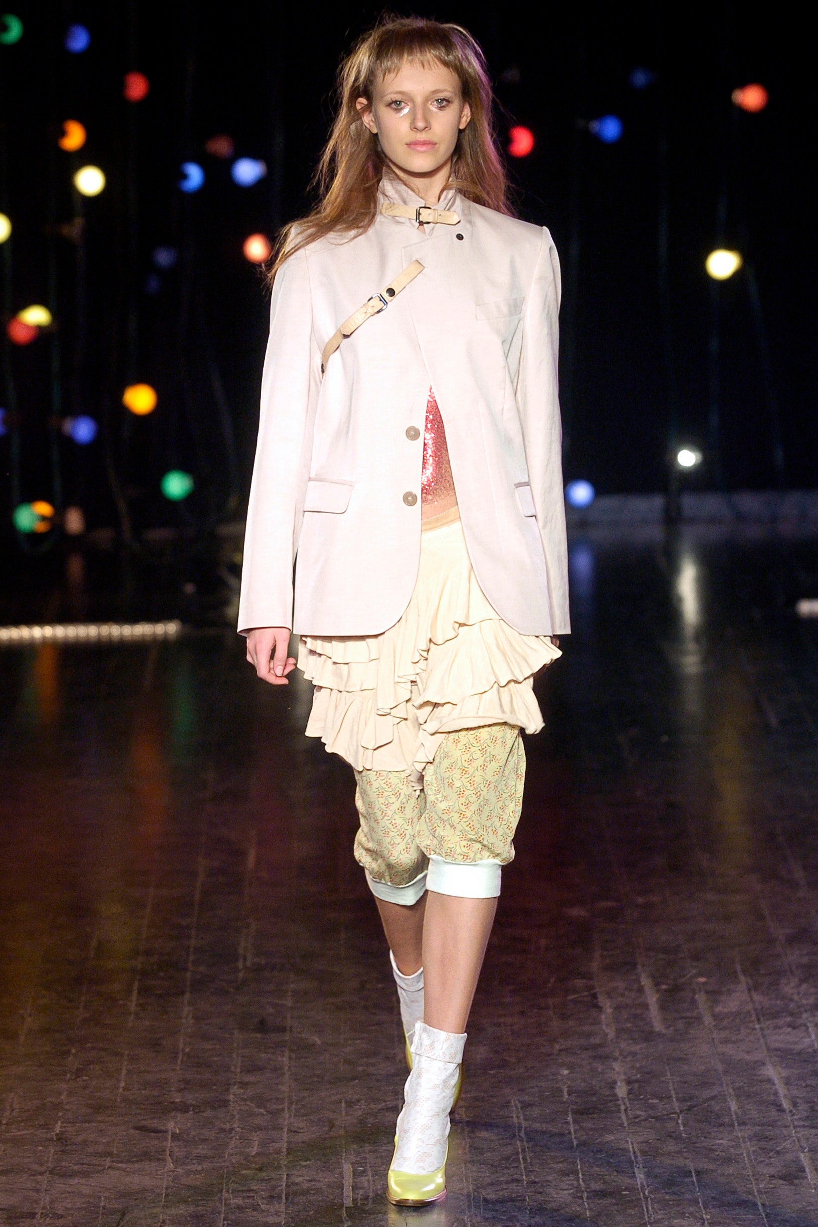 beige tailored blazer with ruffled skirt