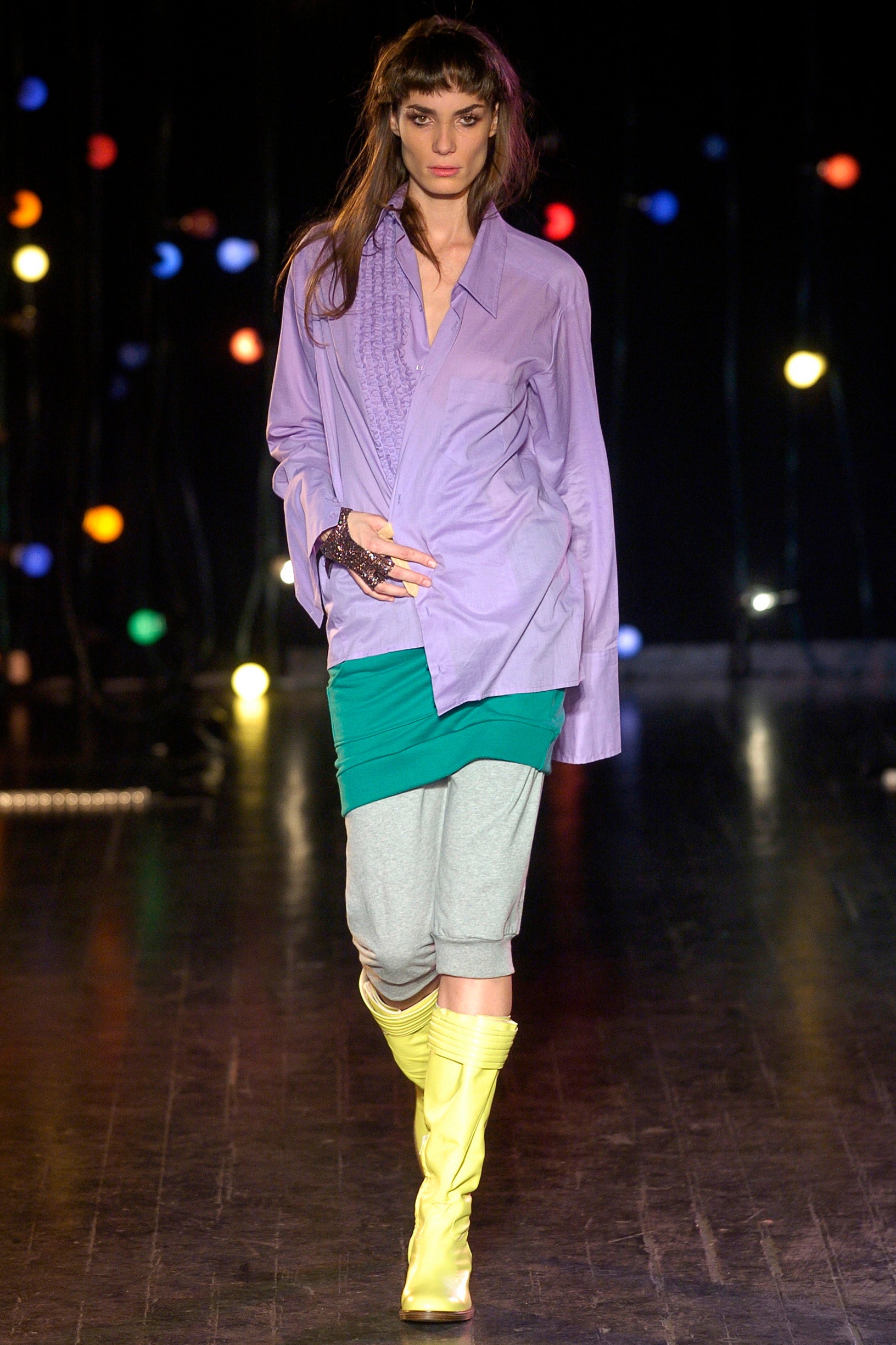 purple shirt green skirt gray pants yellow boots