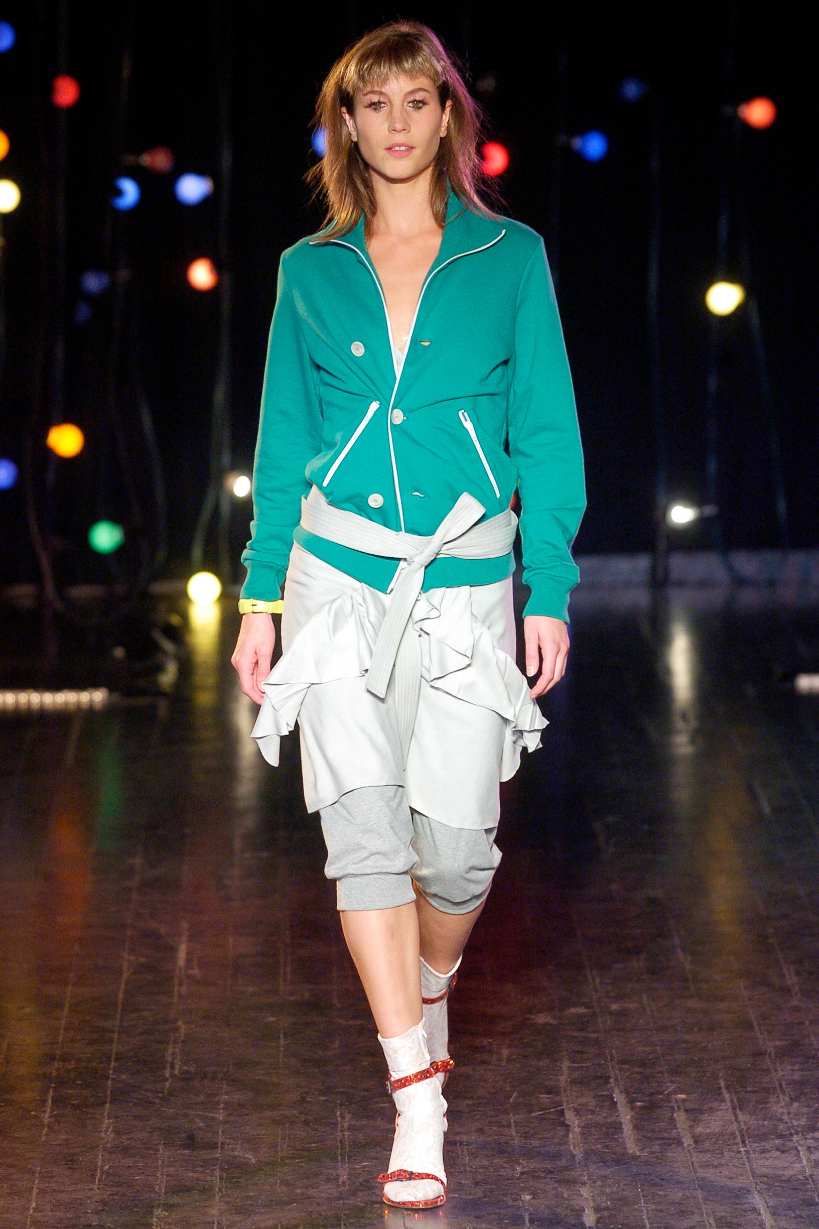 green relaxed jacket with gray pants