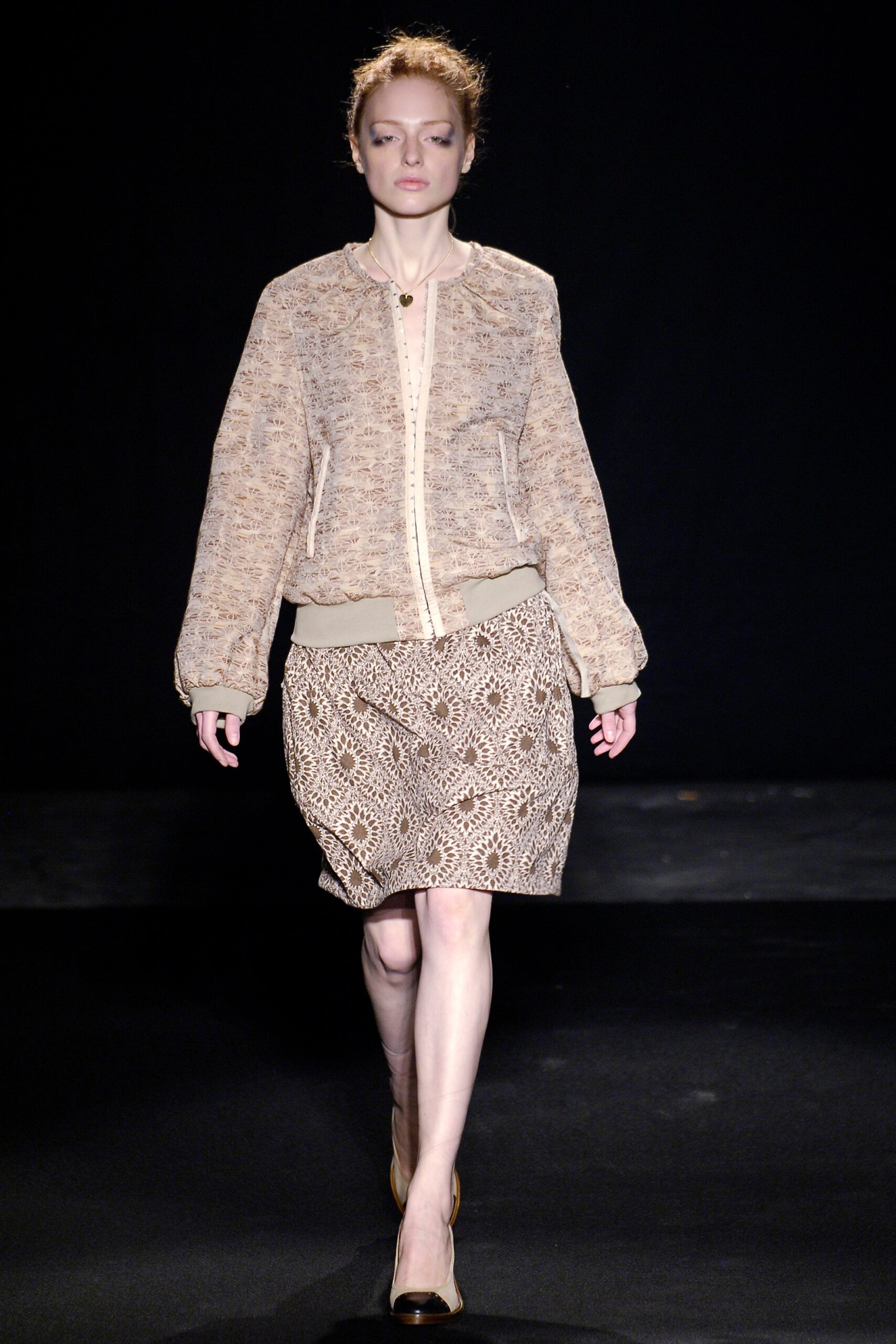 beige embroidered jacket and skirt