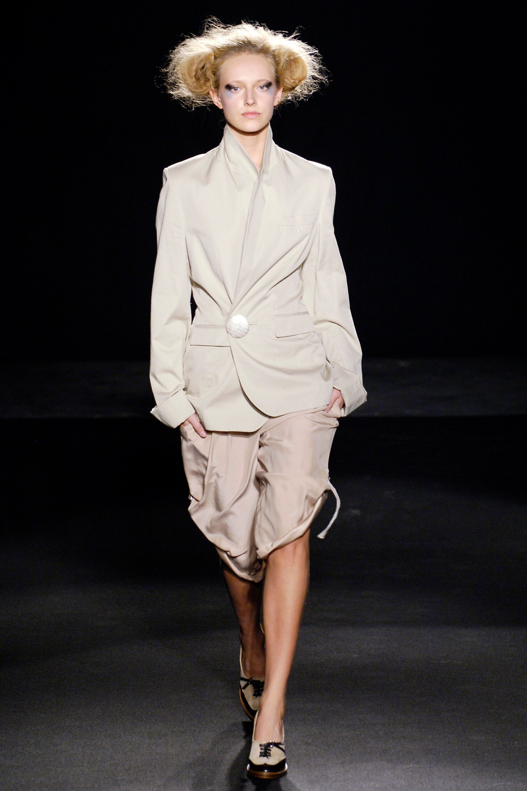 beige tailored blazer and relaxed skirt