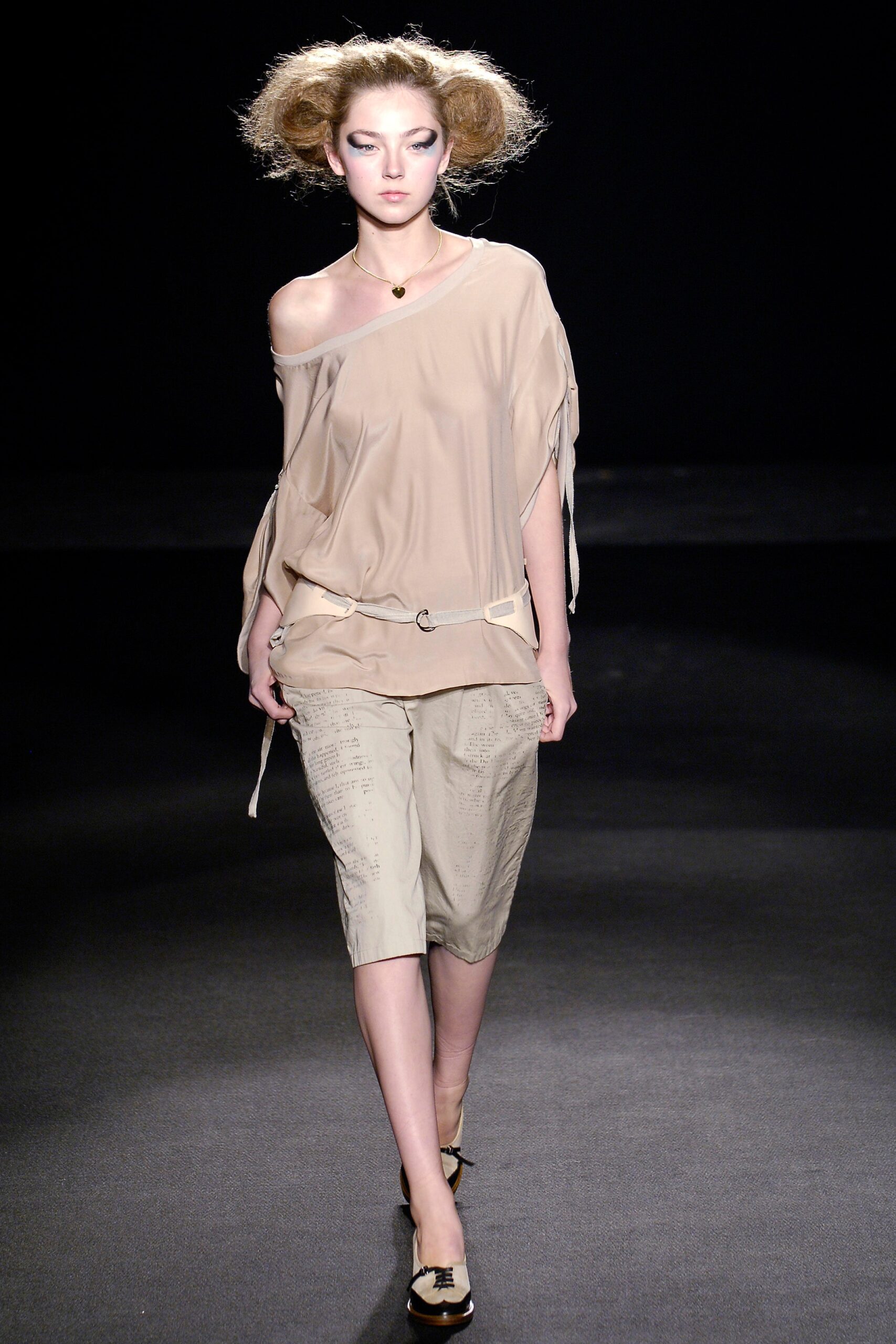 beige relaxed top with gray shorts