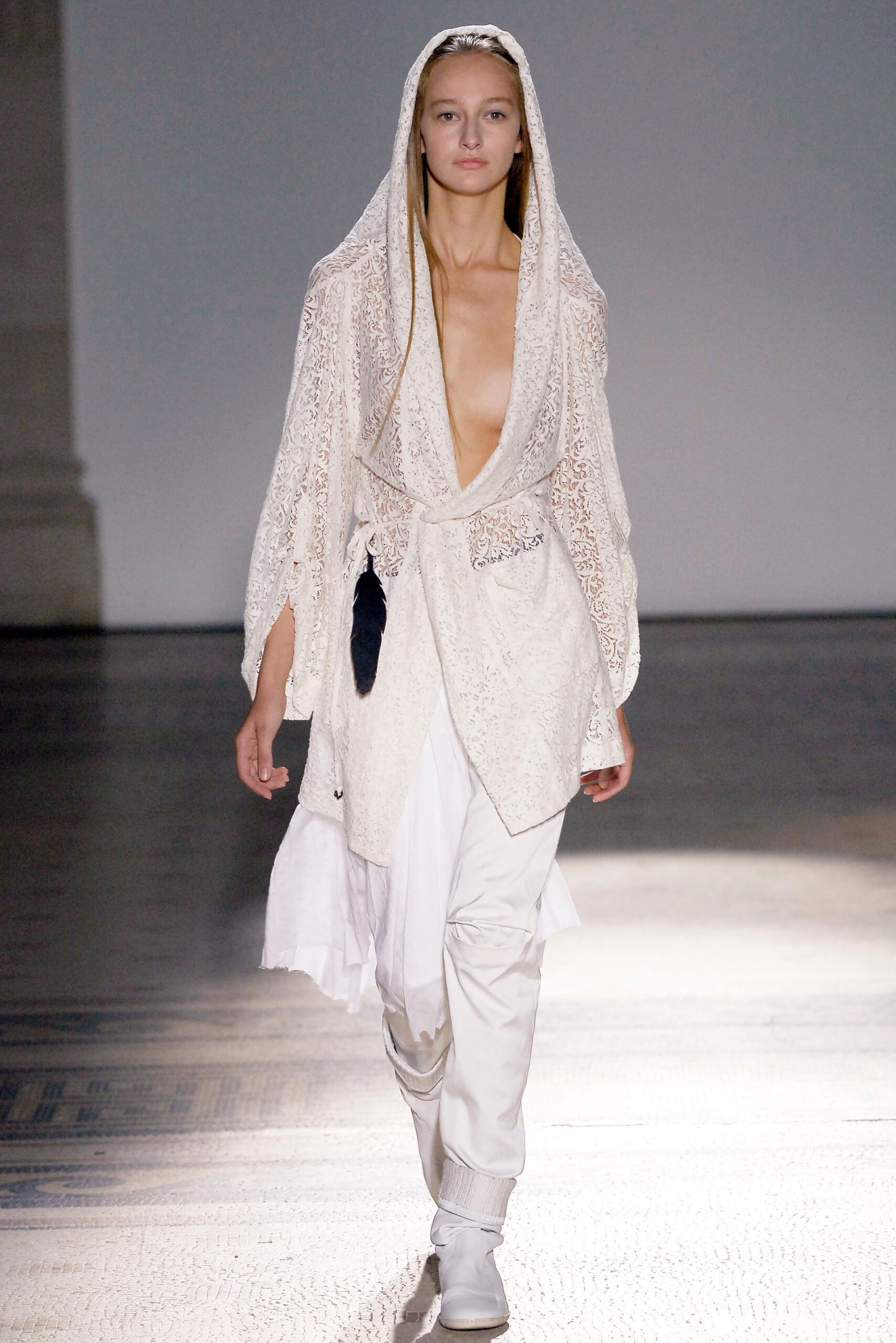 white lace cape and fitted pants