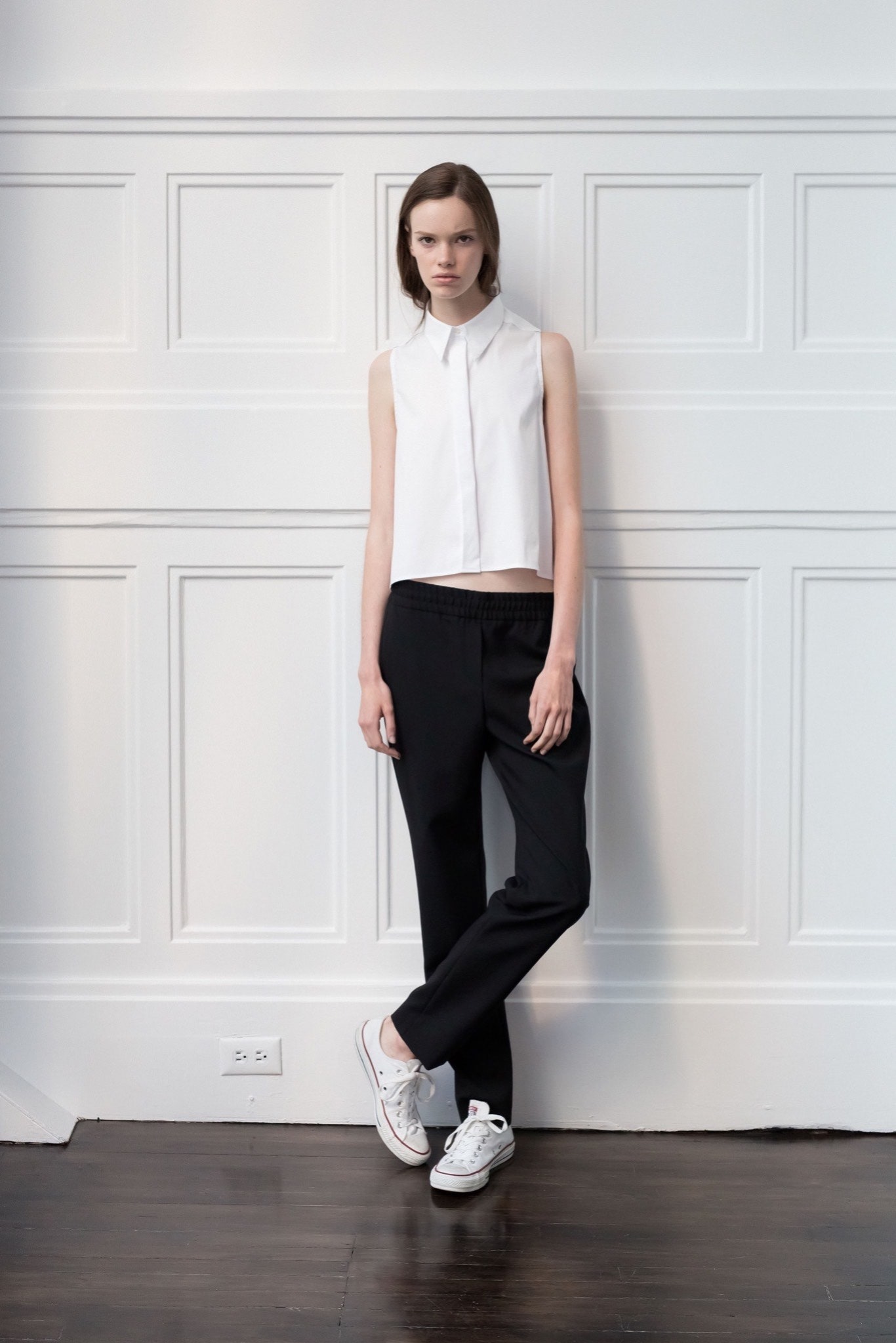 white cropped top and black pants