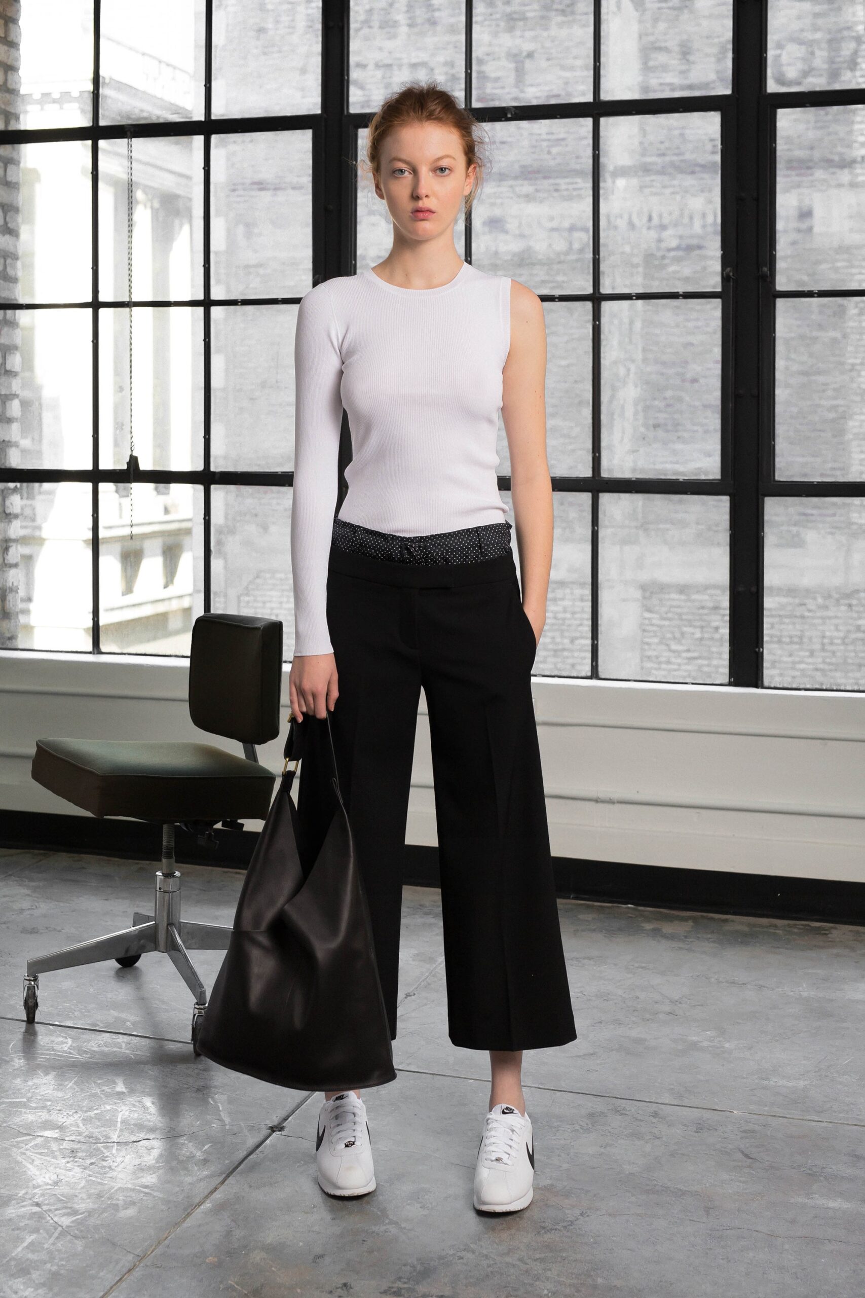 white fitted top with black pants