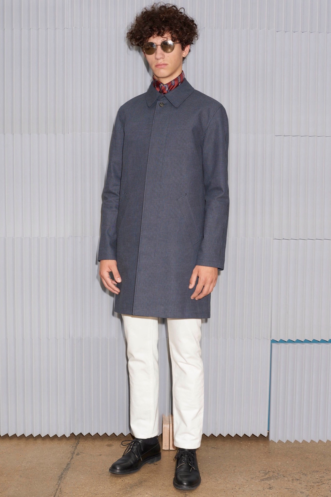 blue coat with red shirt