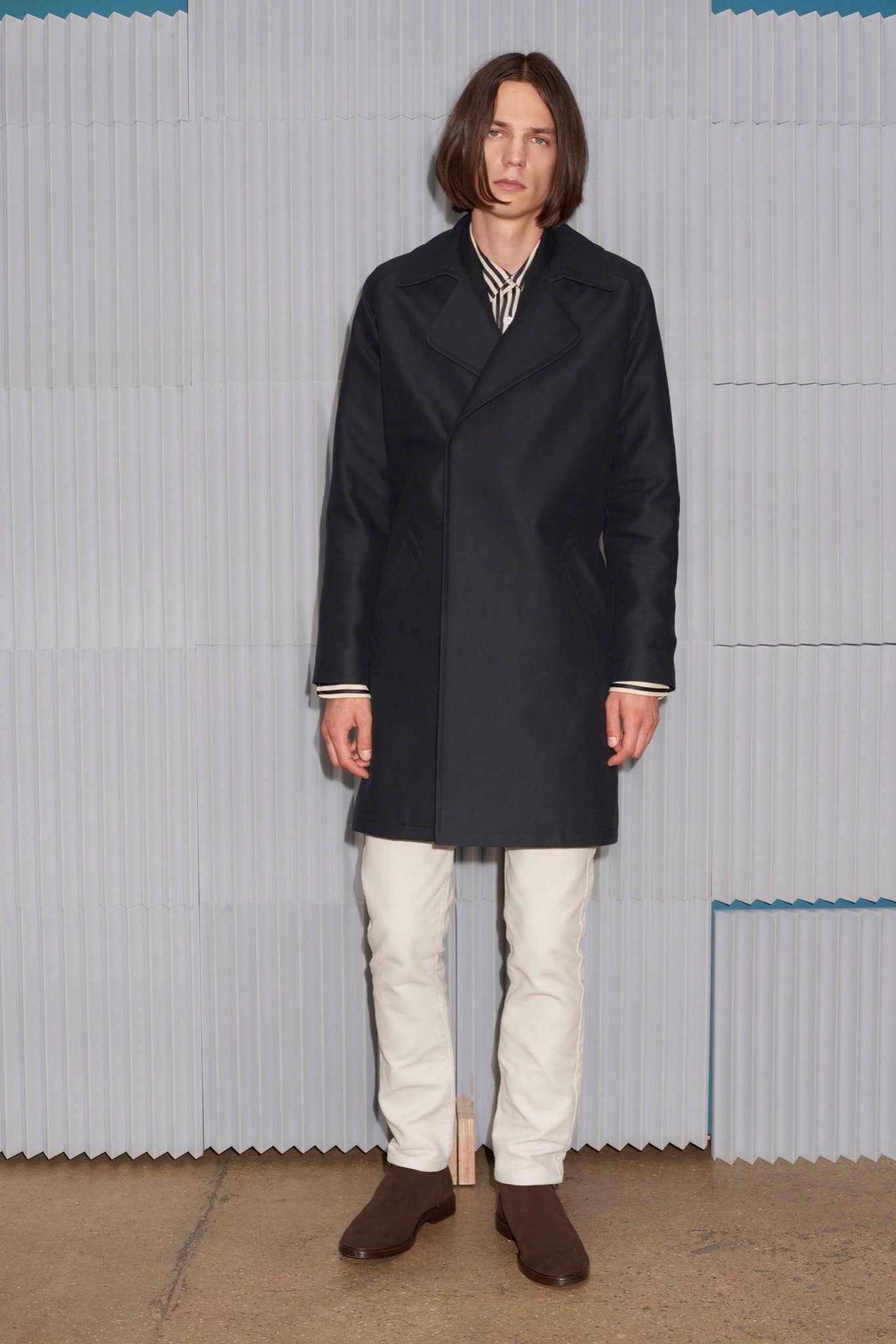 black wool coat with white pants