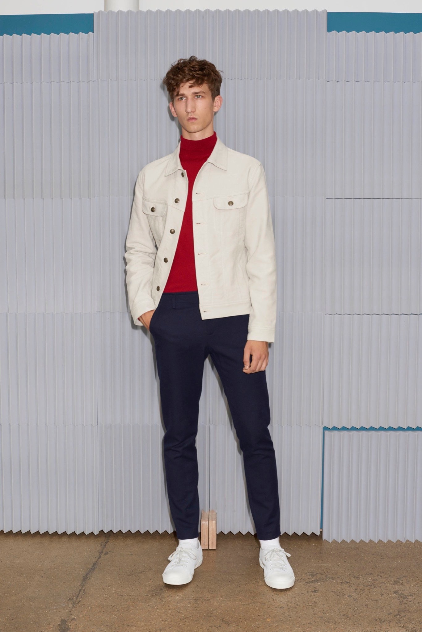 white denim jacket with red turtleneck