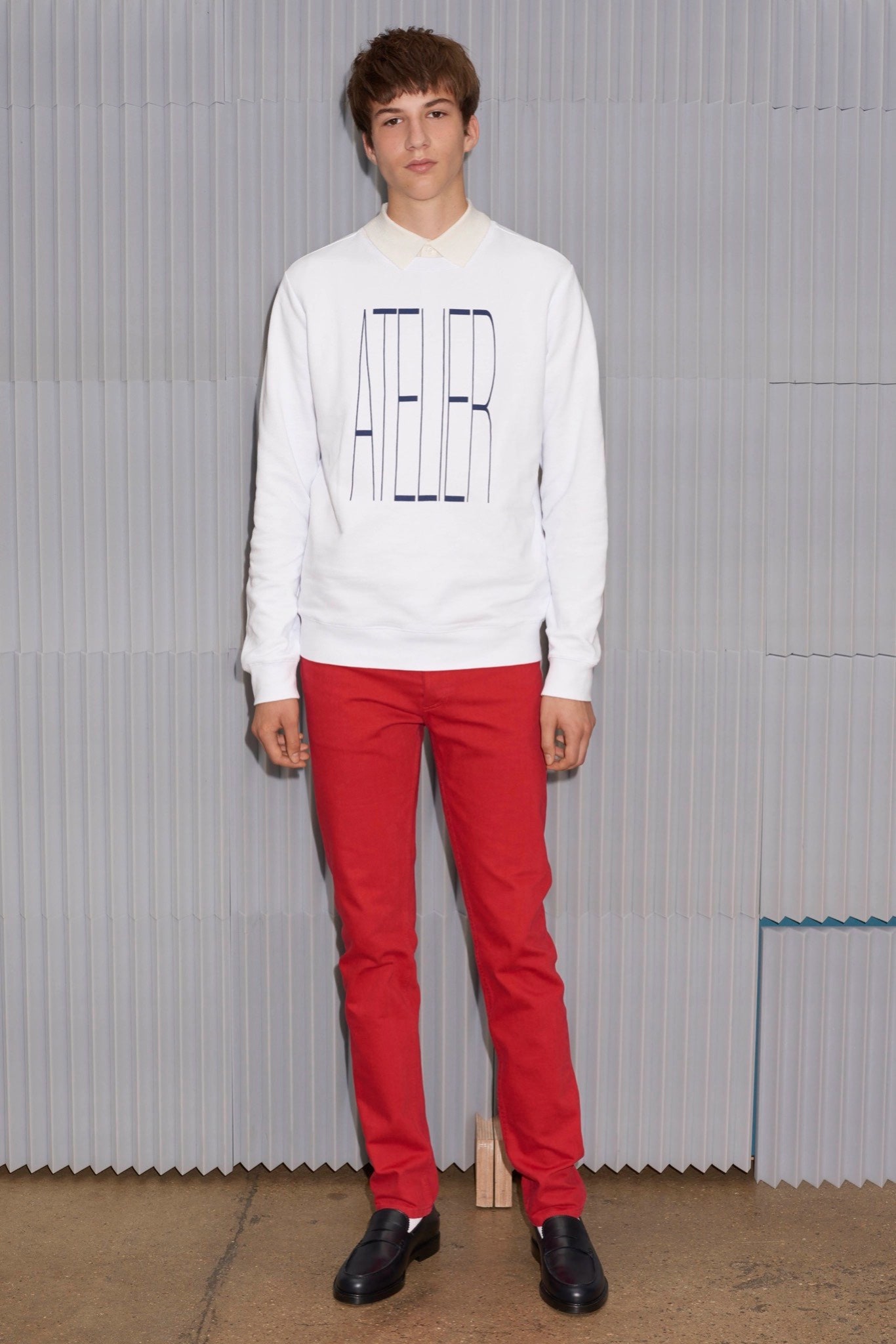 white fitted sweater and red pants