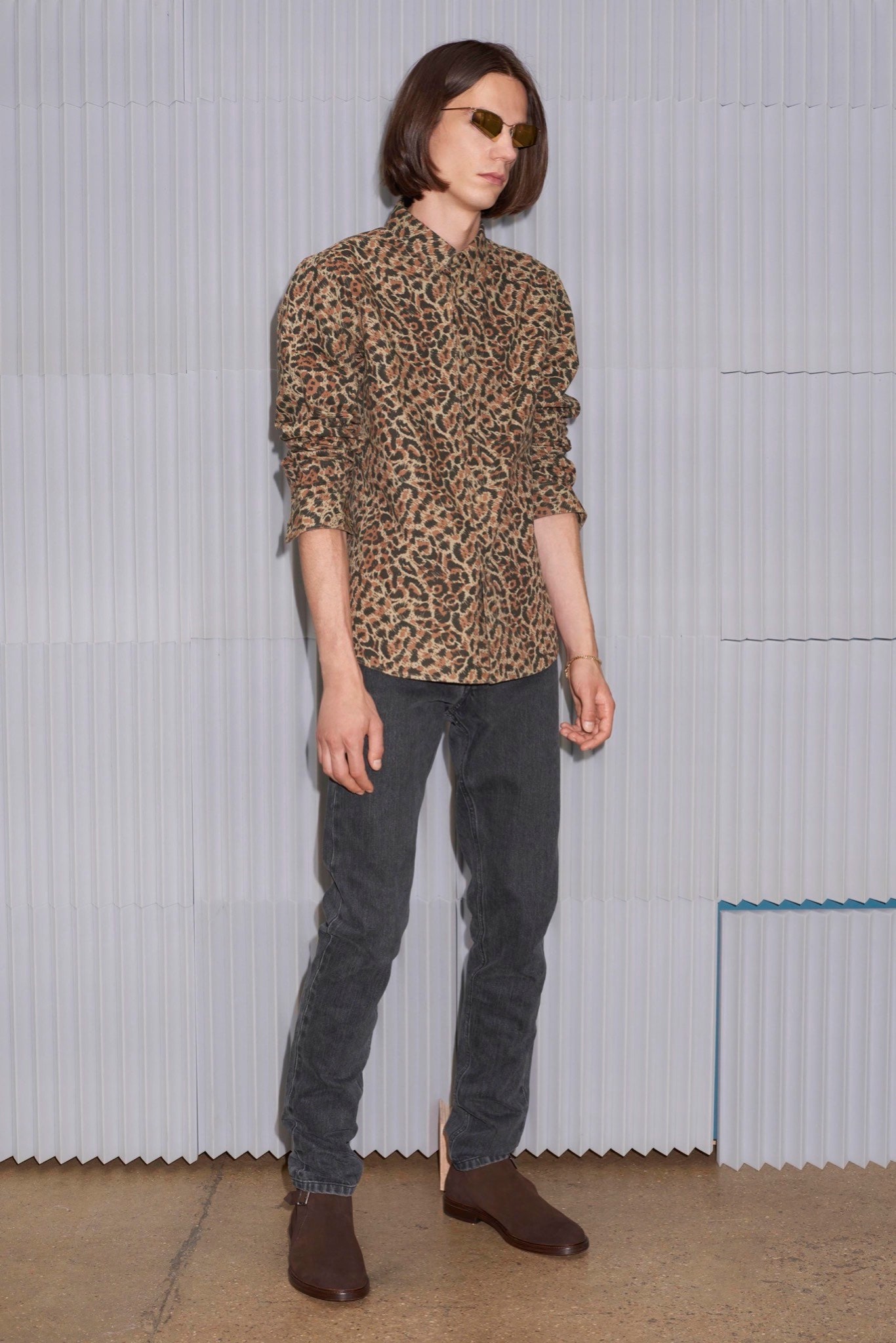 brown animal-print shirt with gray pants