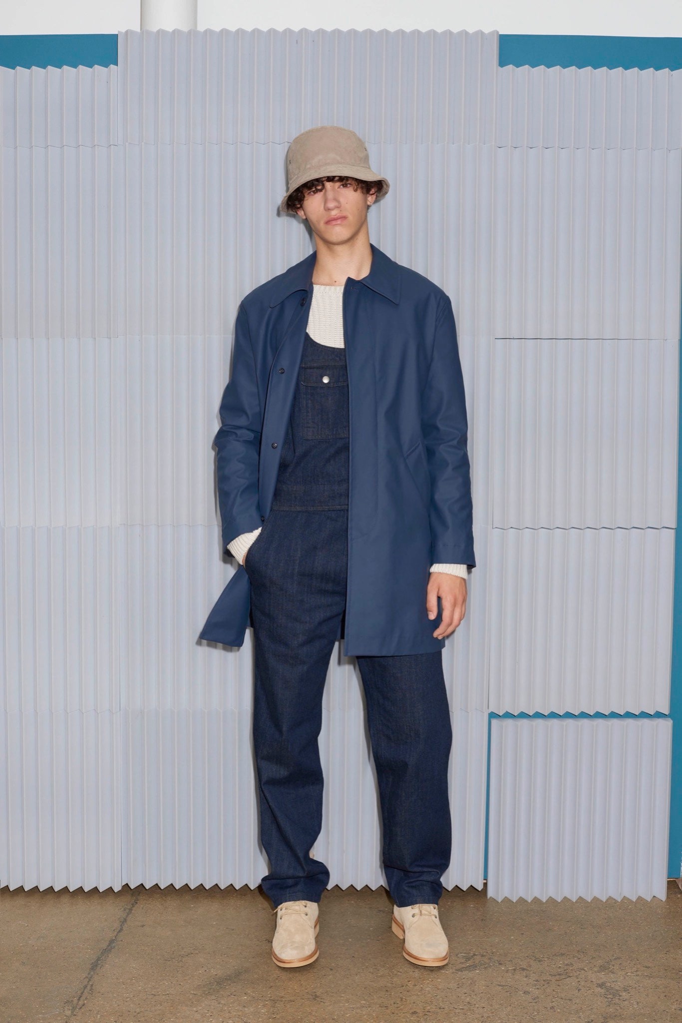 blue vinyl coat with overalls