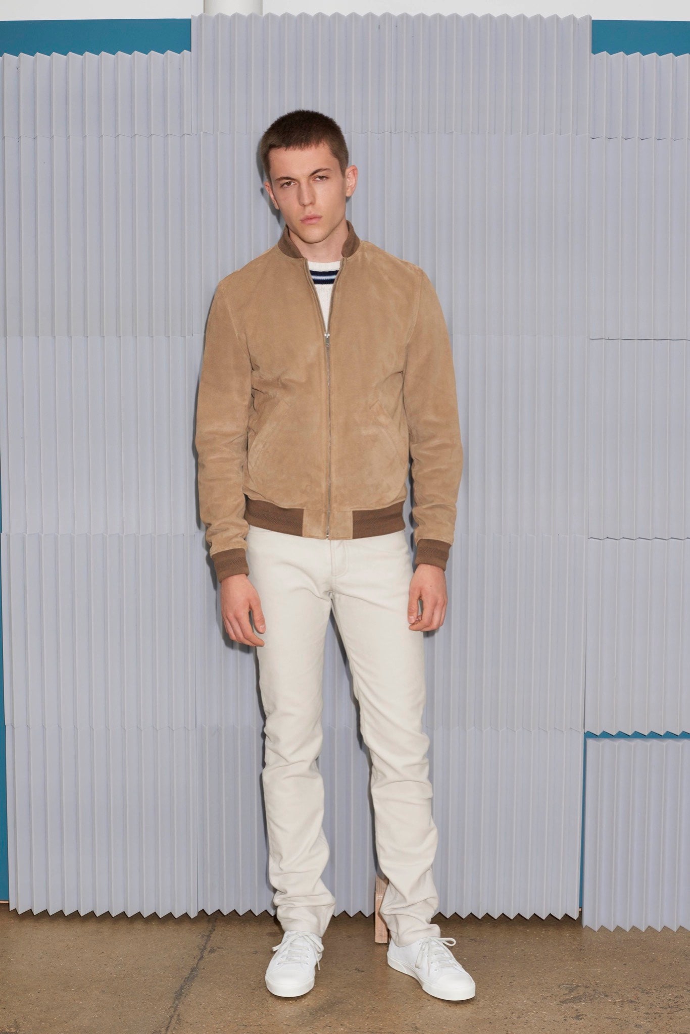 beige suede jacket with white pants