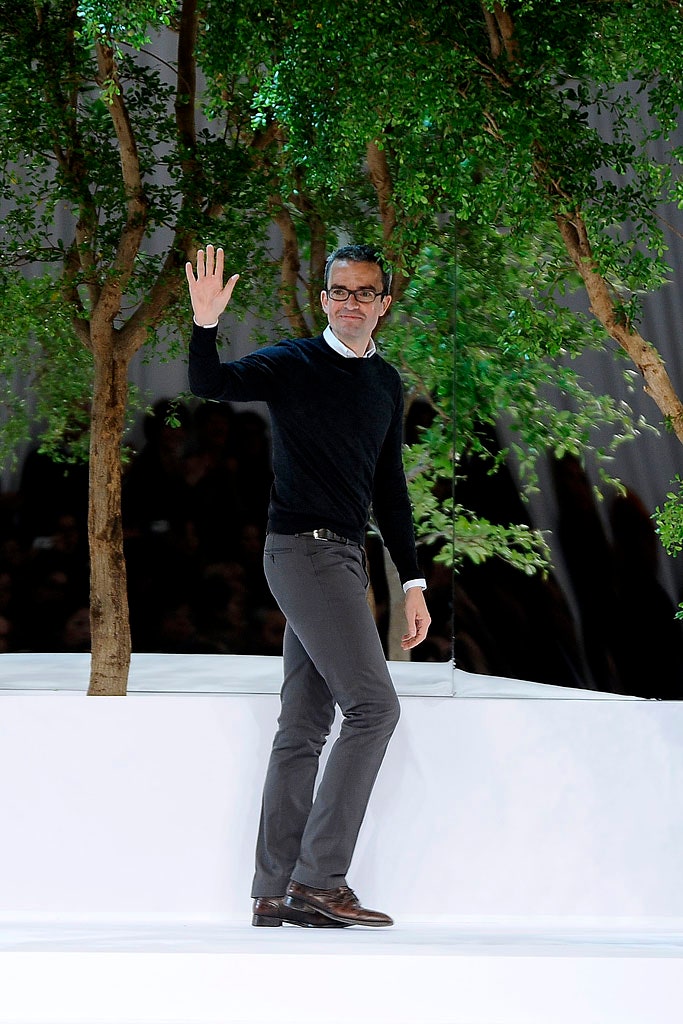 black wool fitted sweater and gray pants
