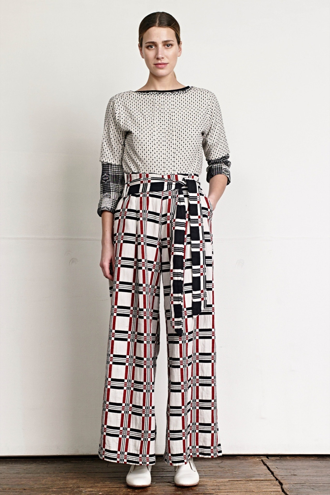 polka-dot top with checked pants