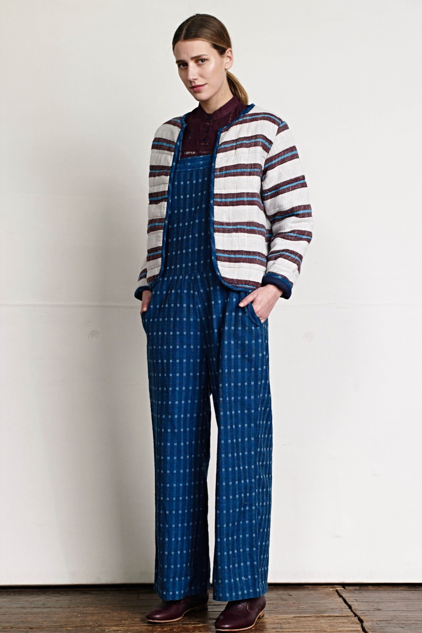 striped cotton jacket and blue overalls