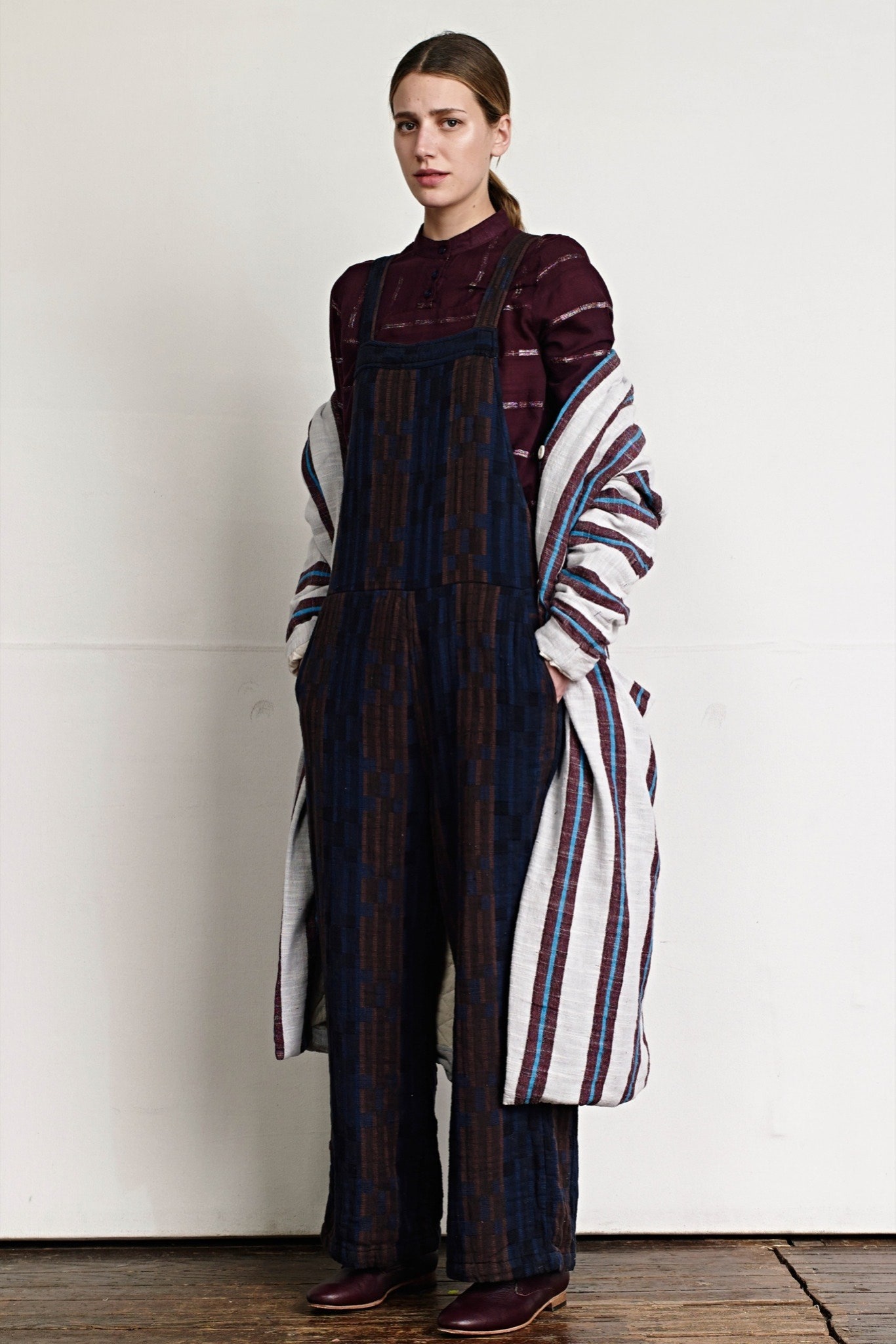 navy brown relaxed jumpsuit with oversized coat