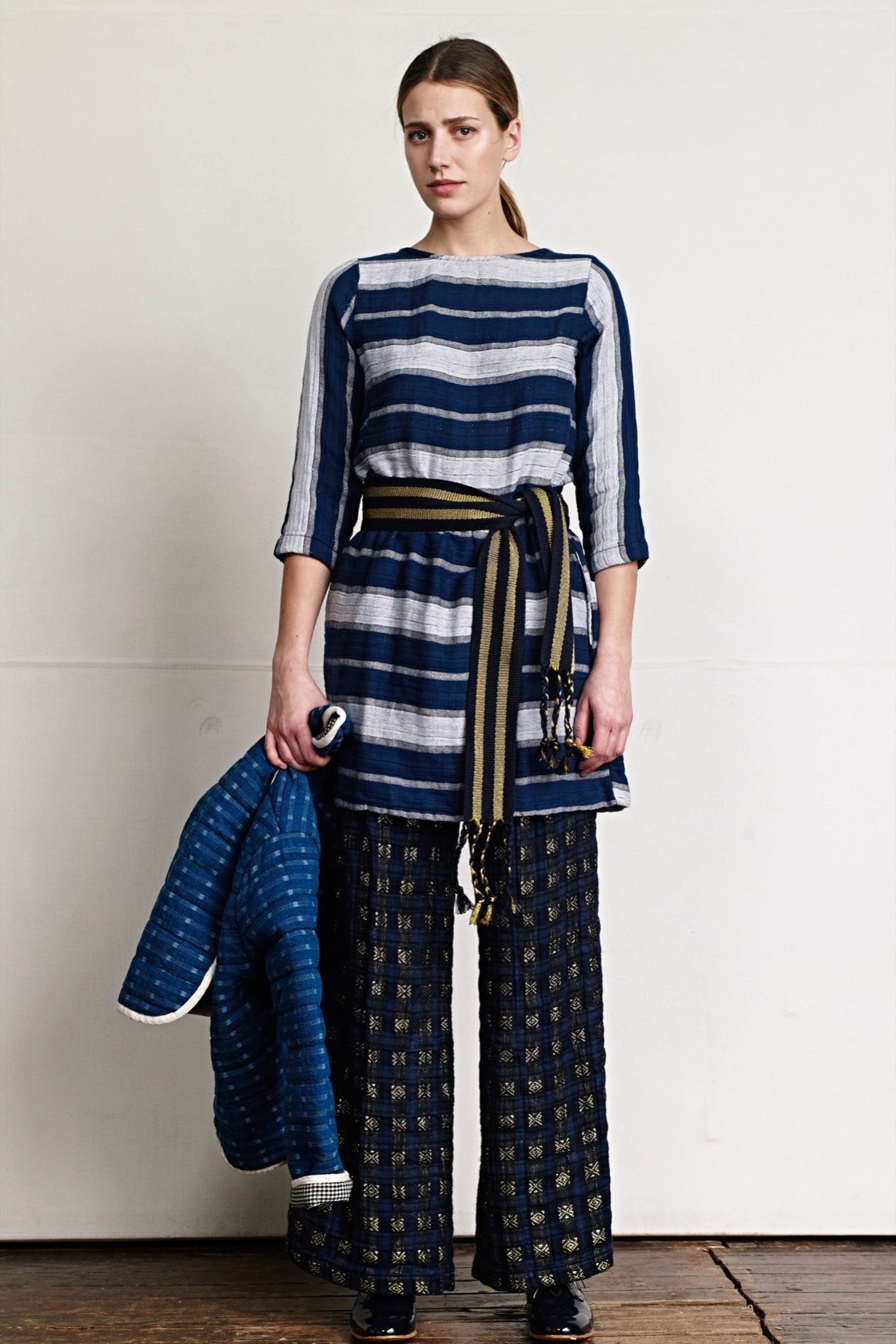 blue and white striped top with wide-leg pants