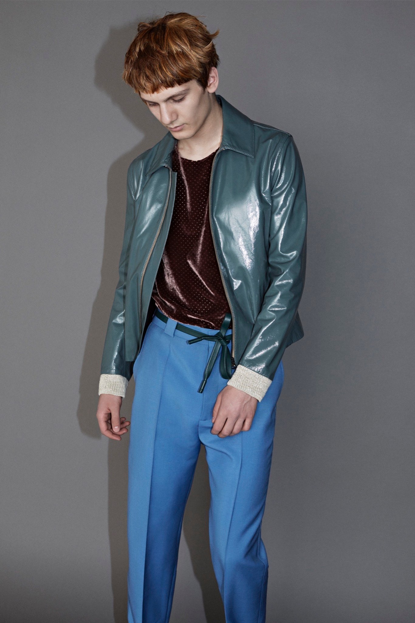 teal vinyl jacket with brown top