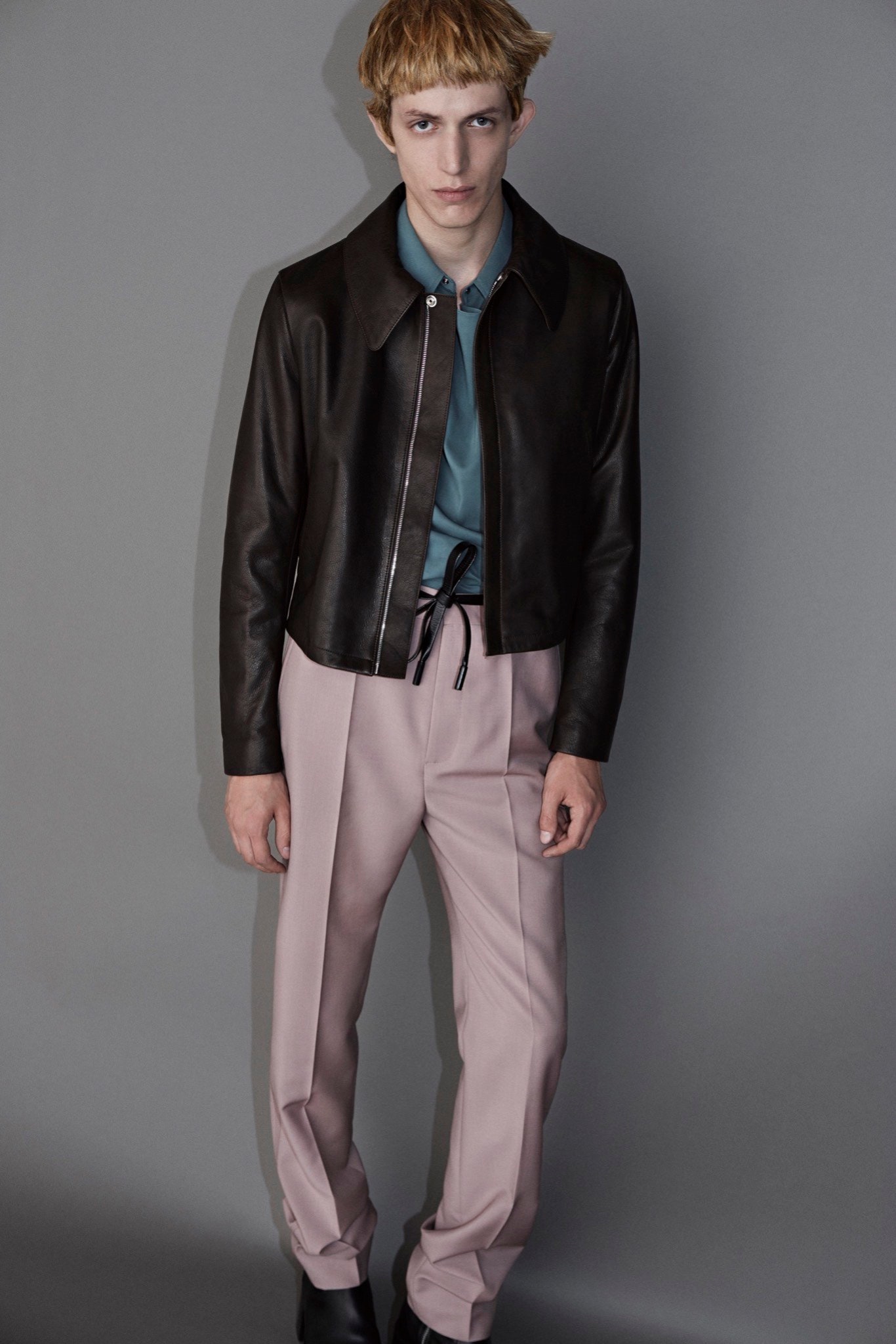 black leather jacket with pink pants