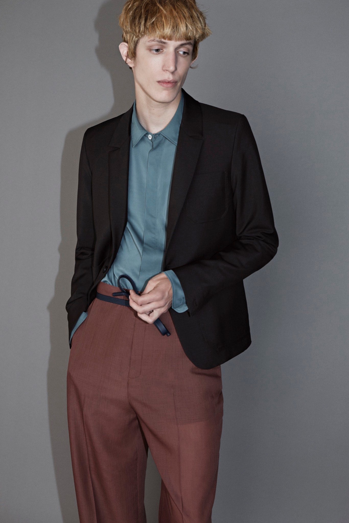black blazer blue shirt brown pants