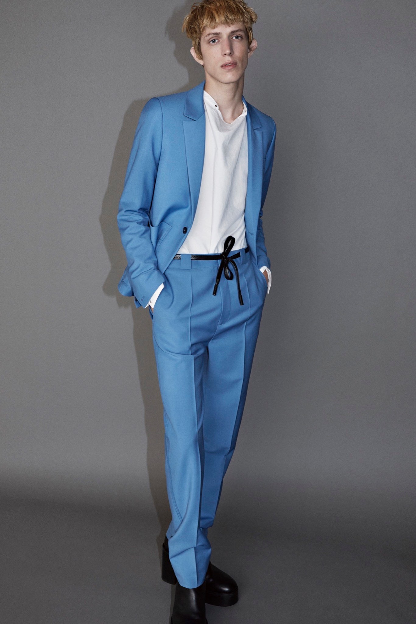 blue tailored suit with white t-shirt