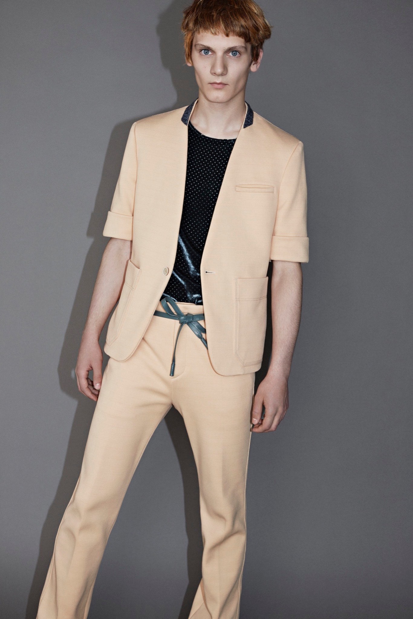 beige tailored blazer with black top